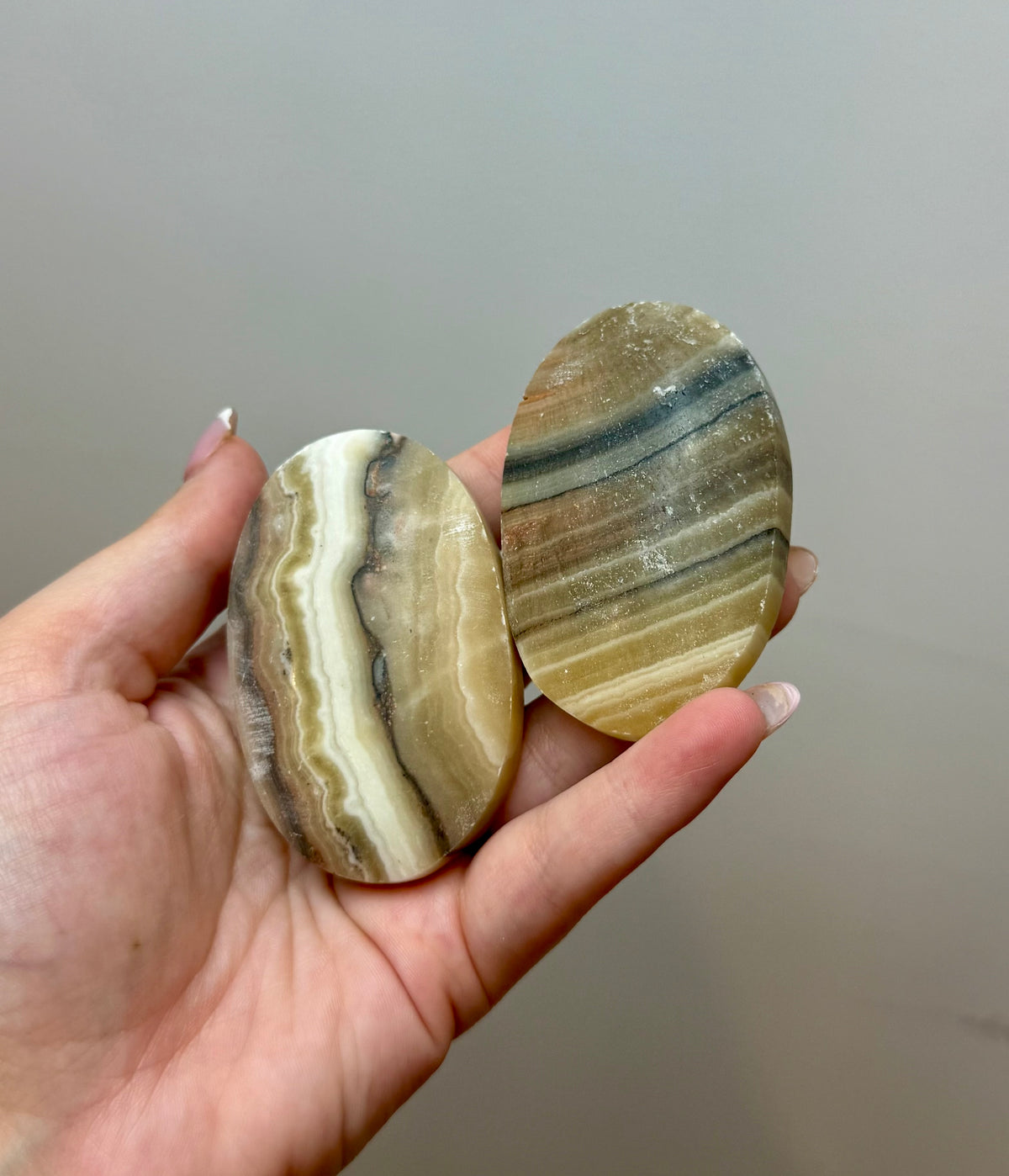 Zebra calcite palm stones