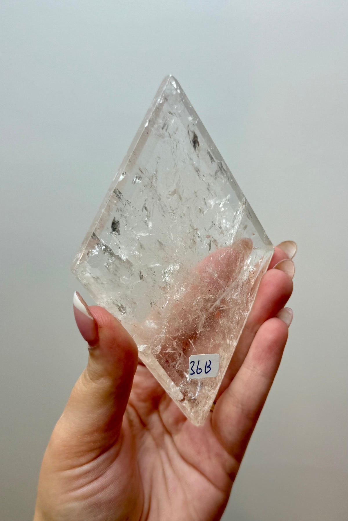 Clear quartz diamond carving on a stand 36B