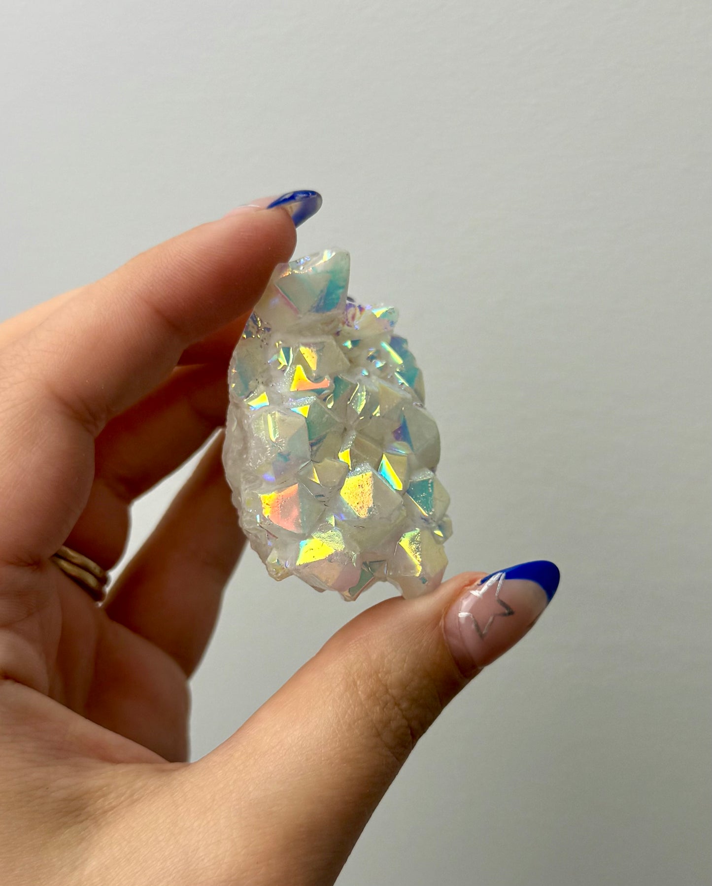 Altered aura quartz cluster