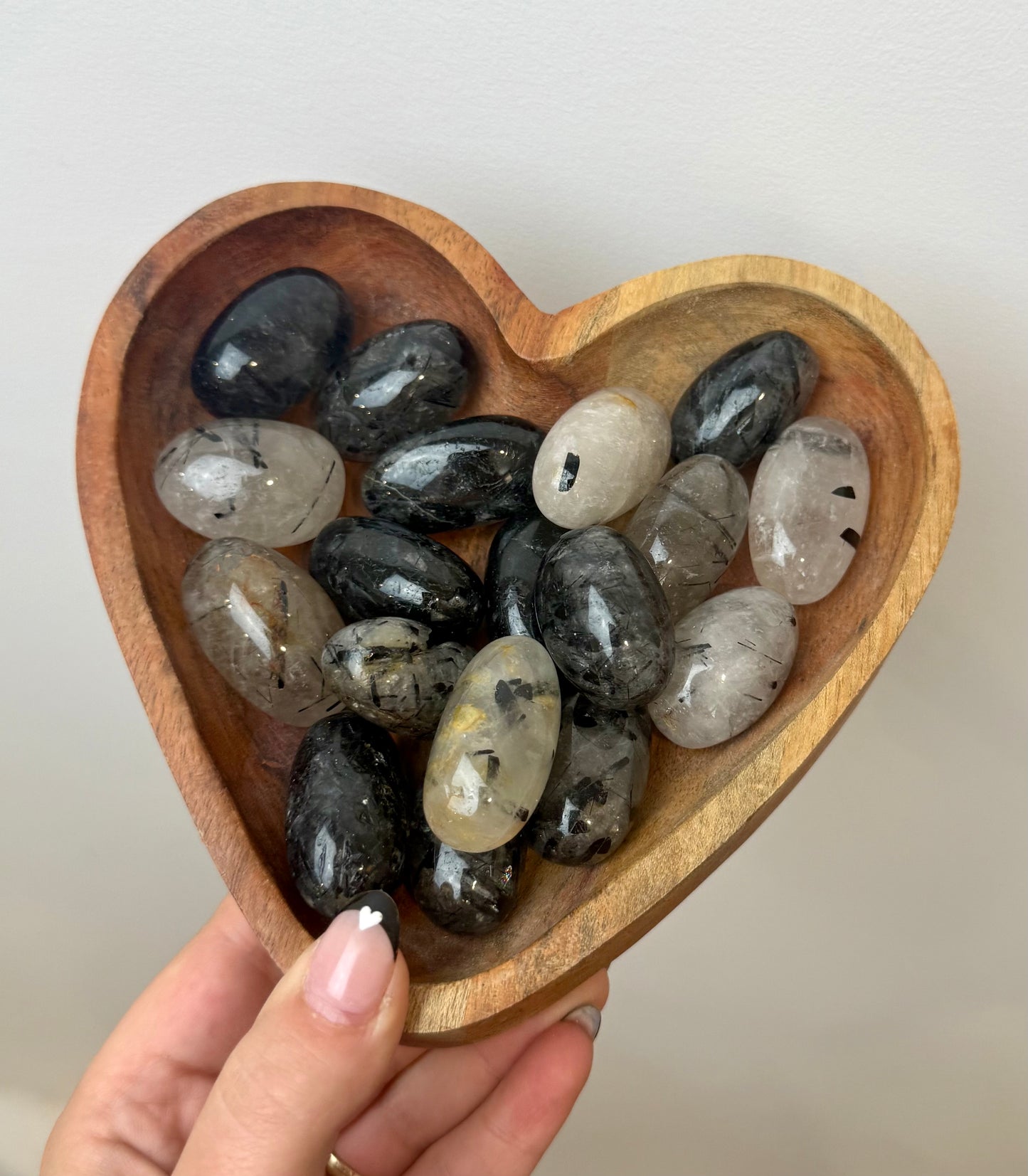 Black tourmaline in quartz tumbles