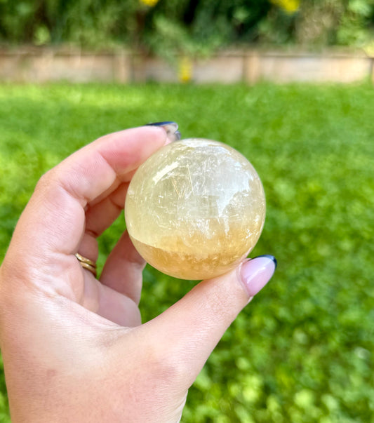 Honey calcite sphere
