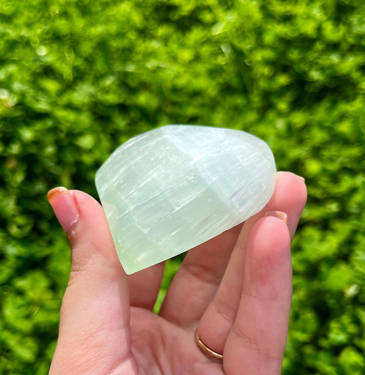 Pistachio calcite heart carving