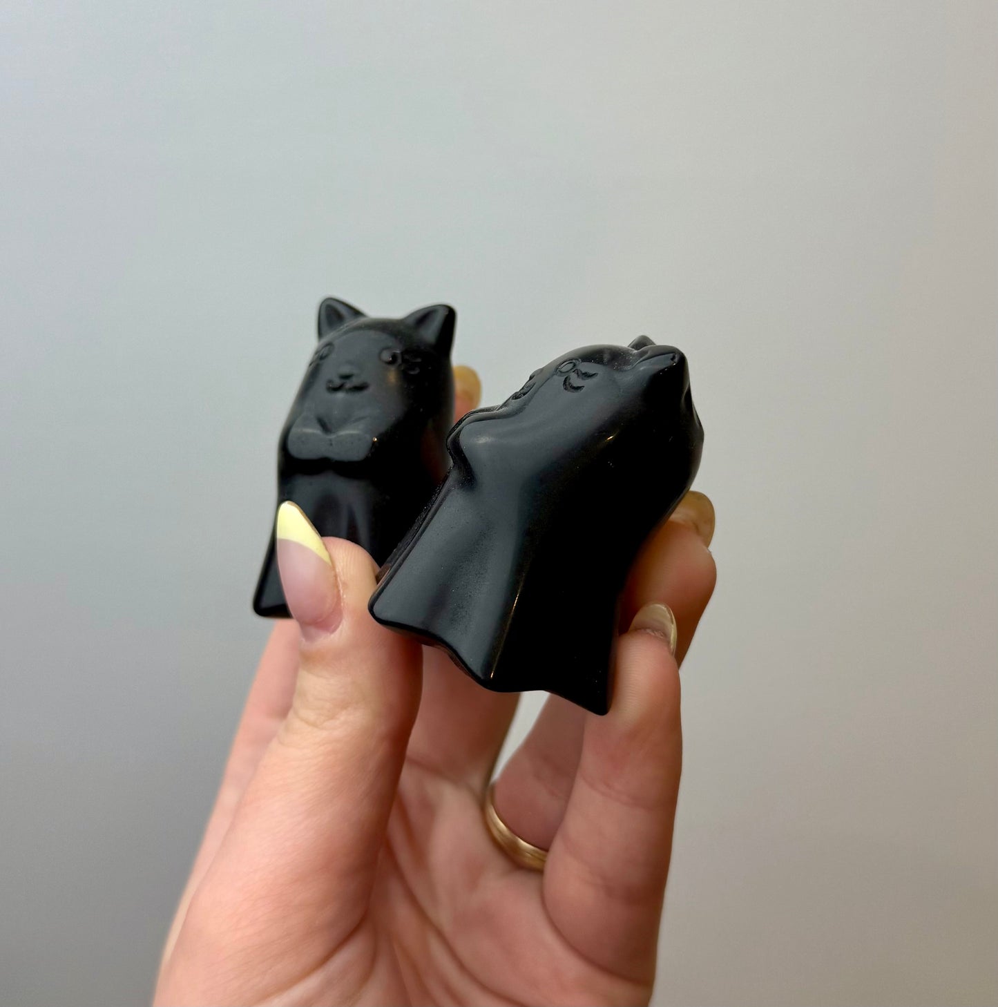 Obsidian ghost cat carvings