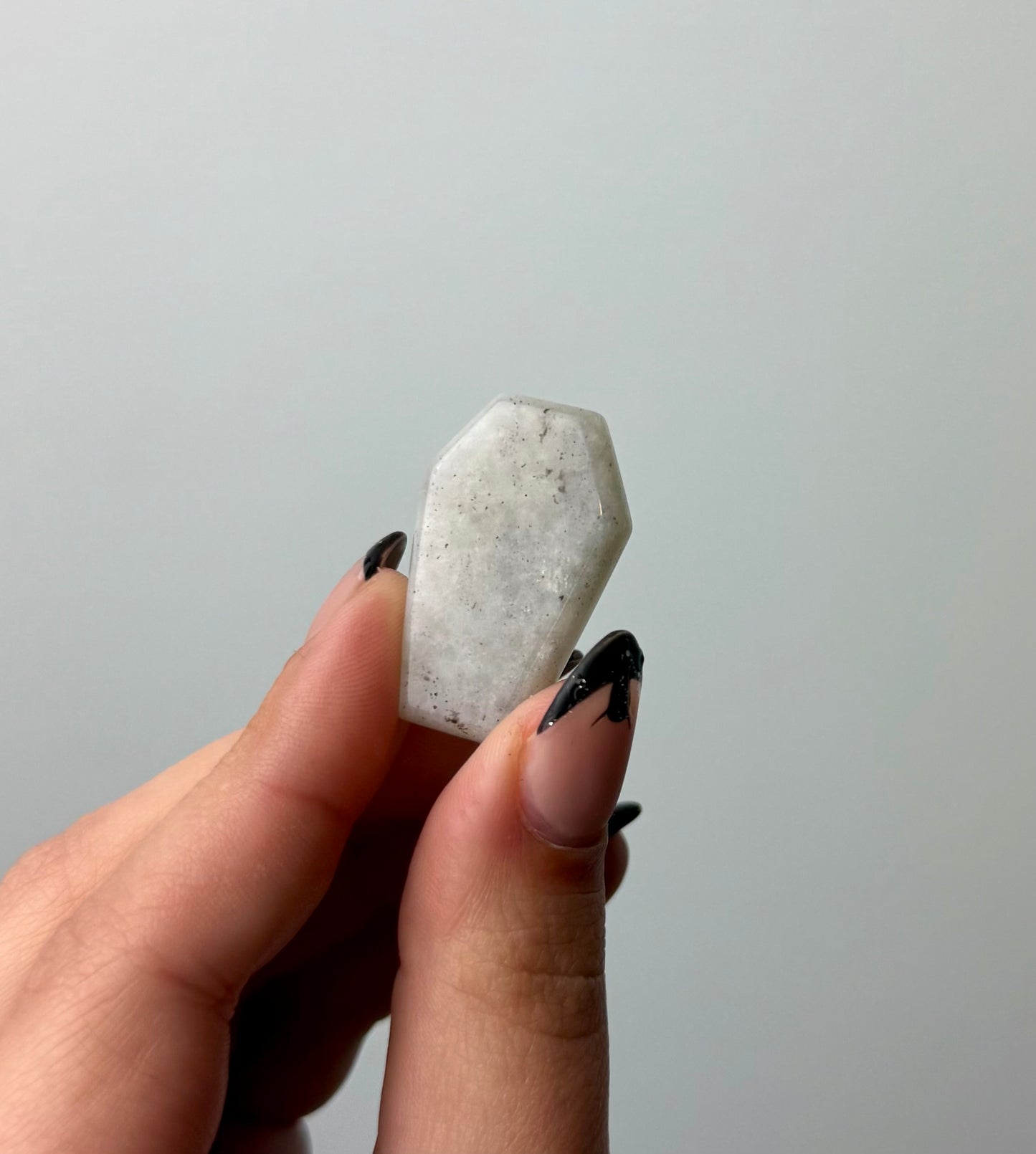 Labradorite coffin carving