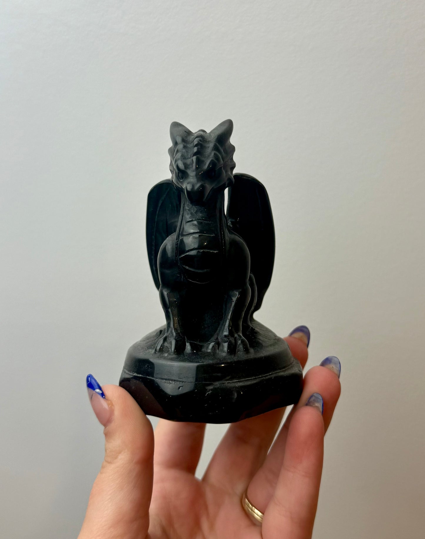 Obsidian dragon carving