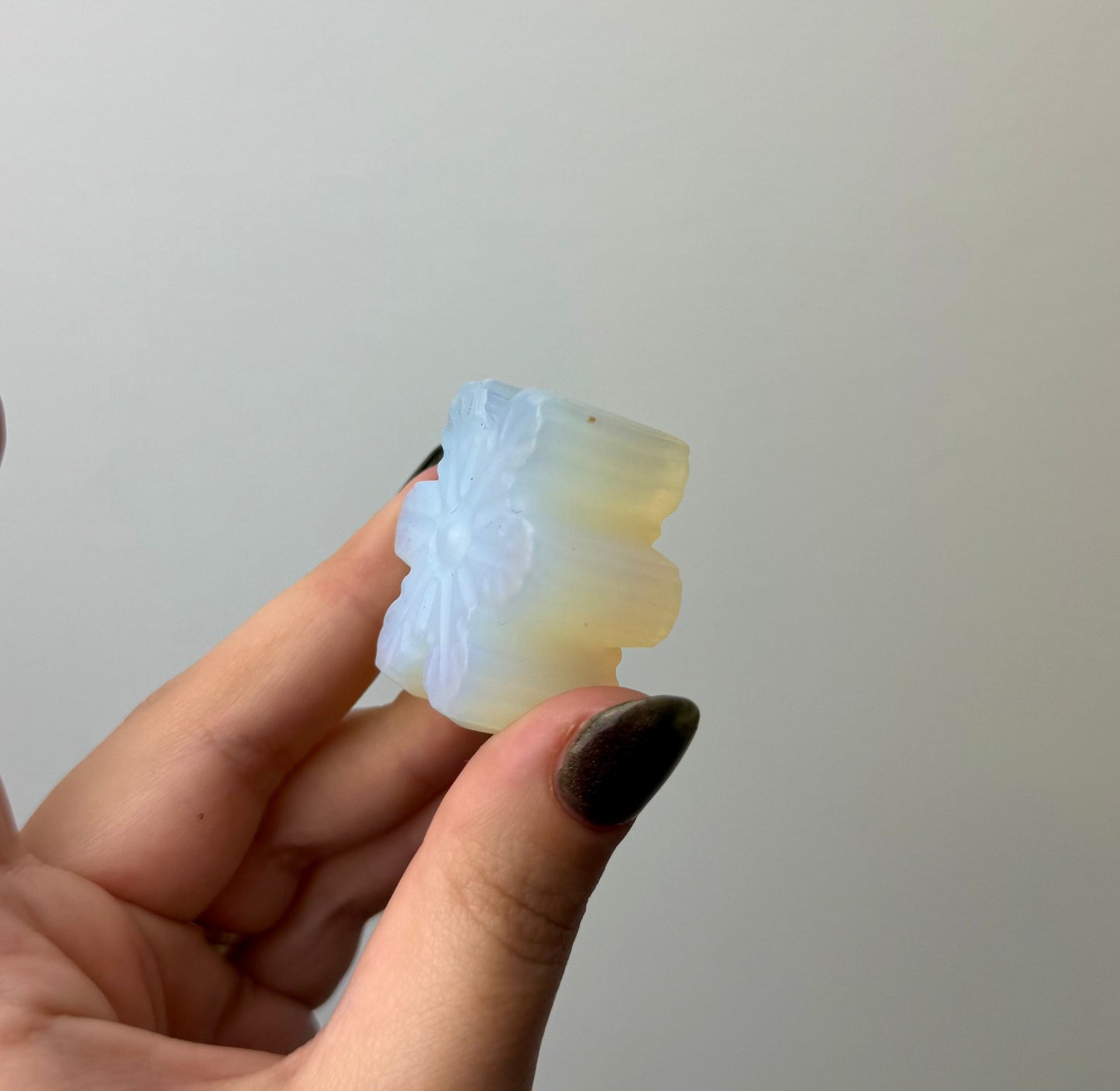 Man made material Opalite snowflake carving