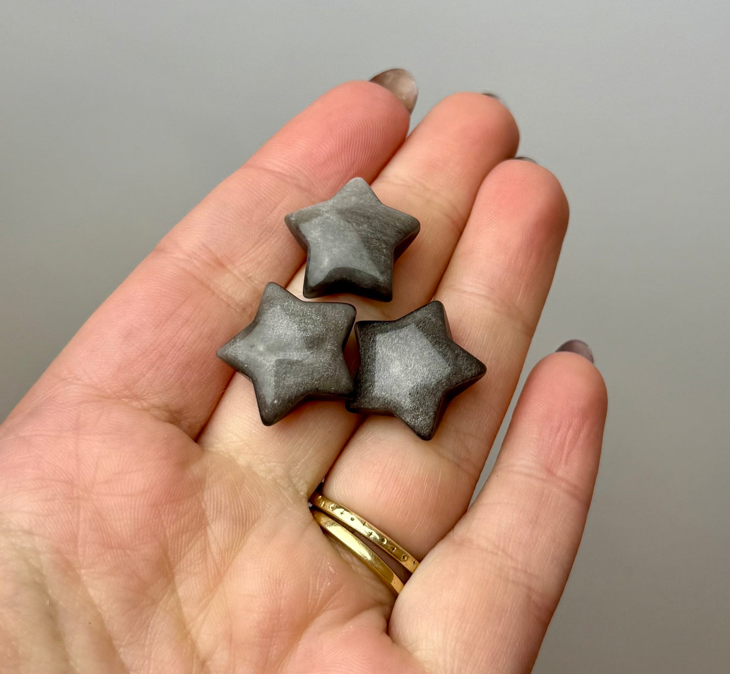 Silver sheen obsidian star carvings