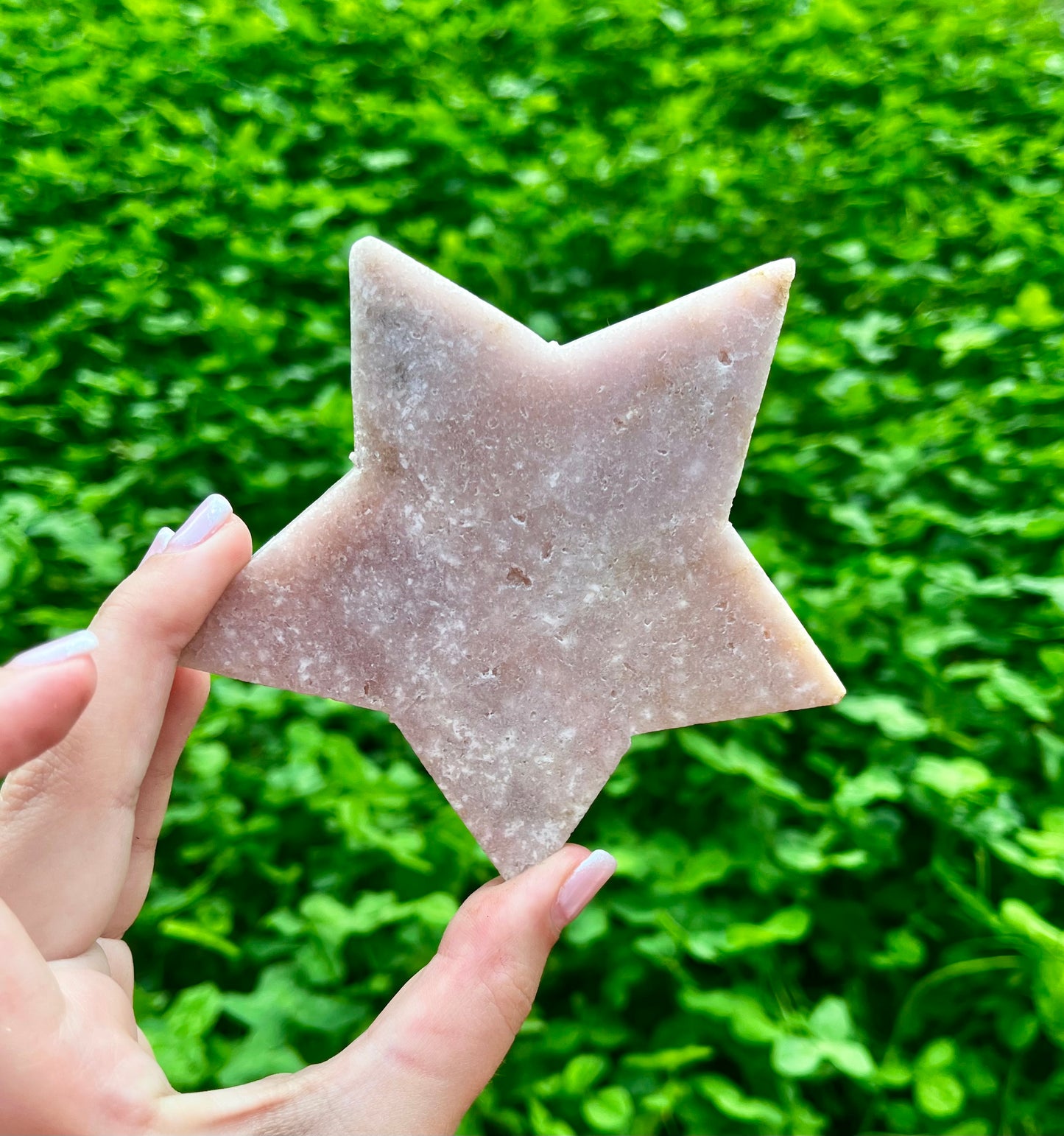 Pink amethyst star carving