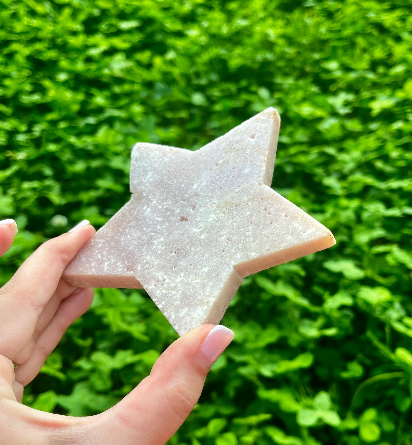 Pink amethyst star carving