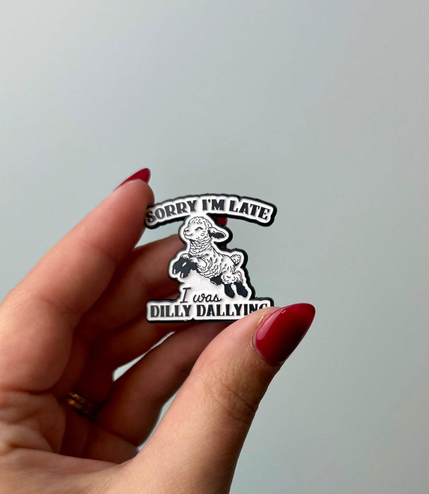 Dilly dallying enamel pin