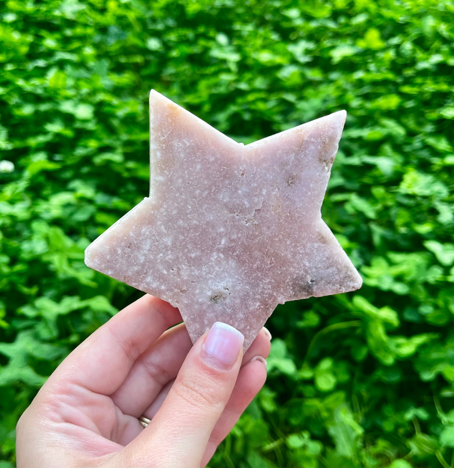 Pink amethyst star carving