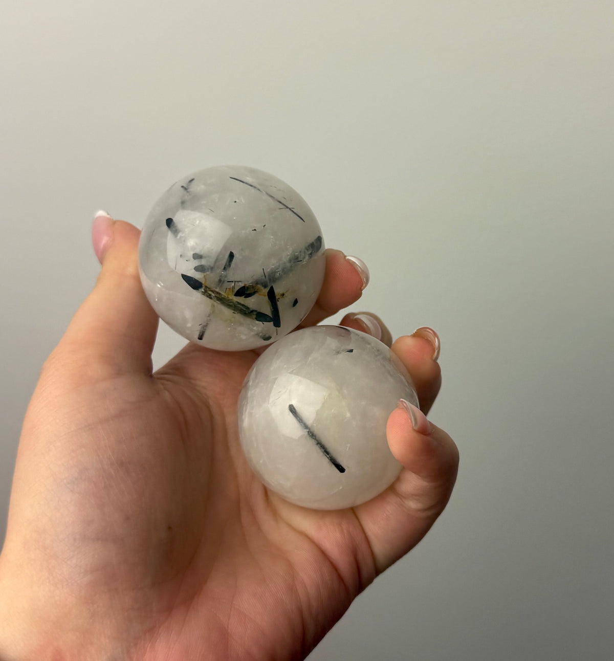 Black tourmaline in quartz spheres