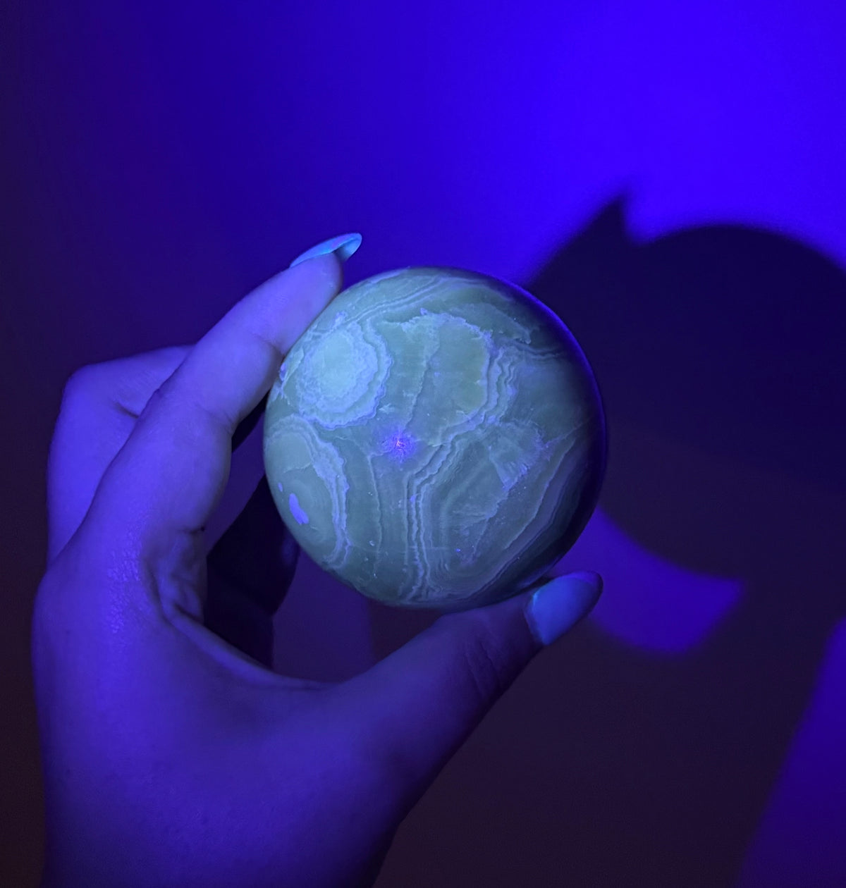 Amber calcite sphere