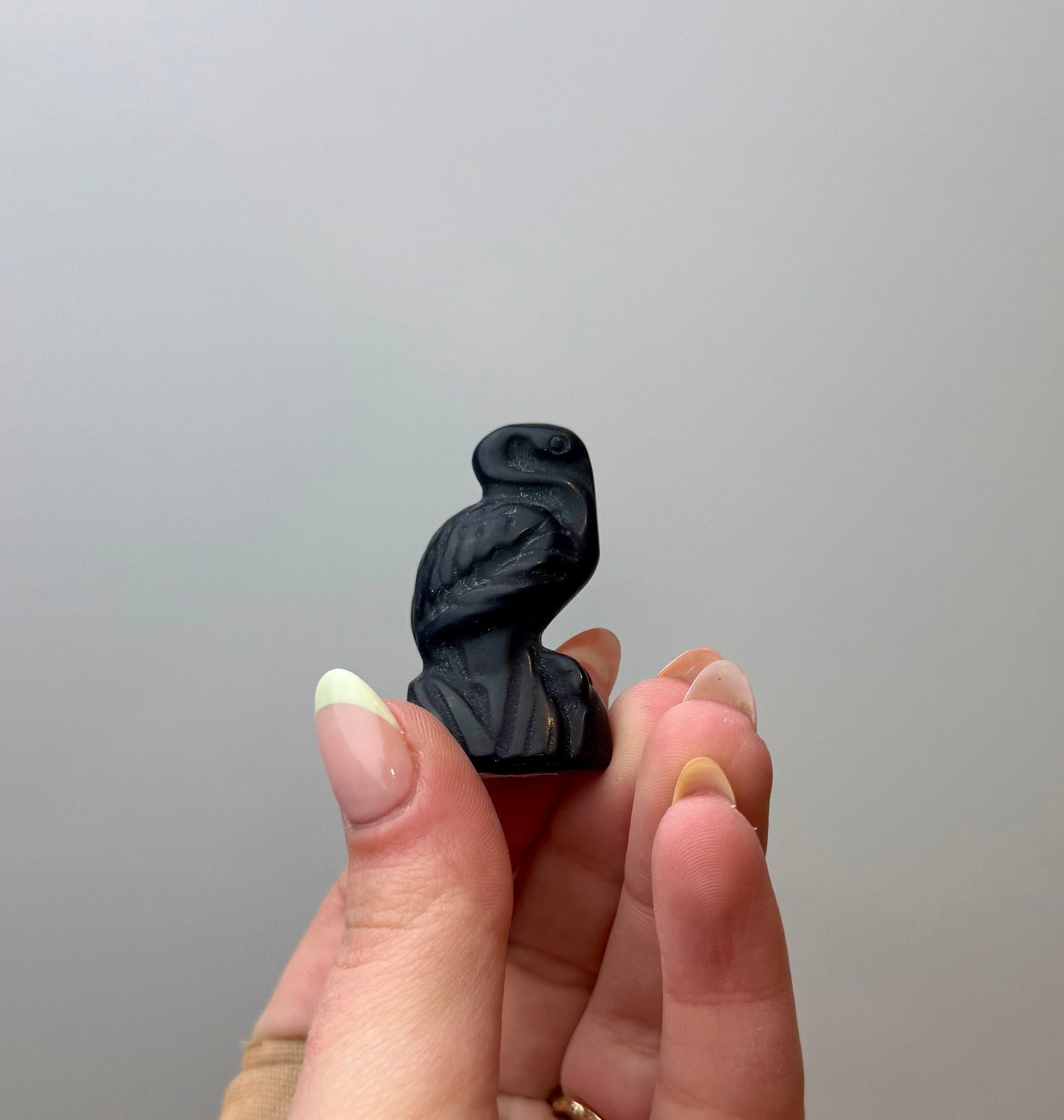 Obsidian flamingo carving