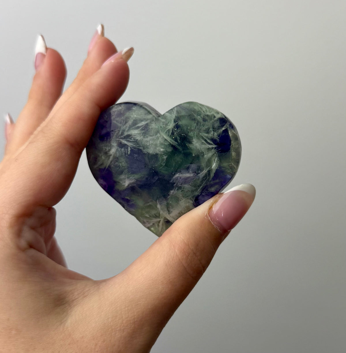 Feather fluorite heart carving