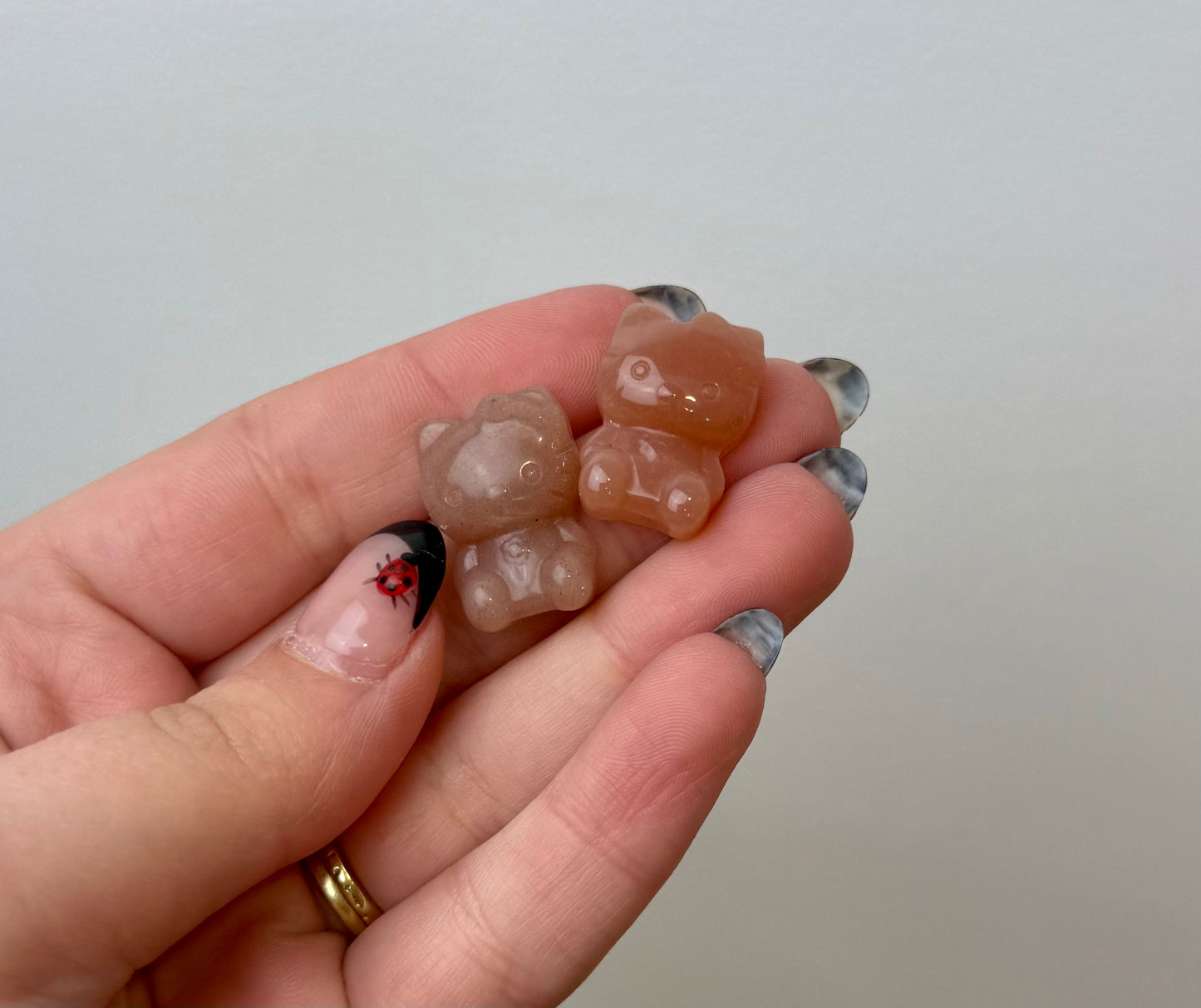 Peach moonstone sunstone hello kitty carvings