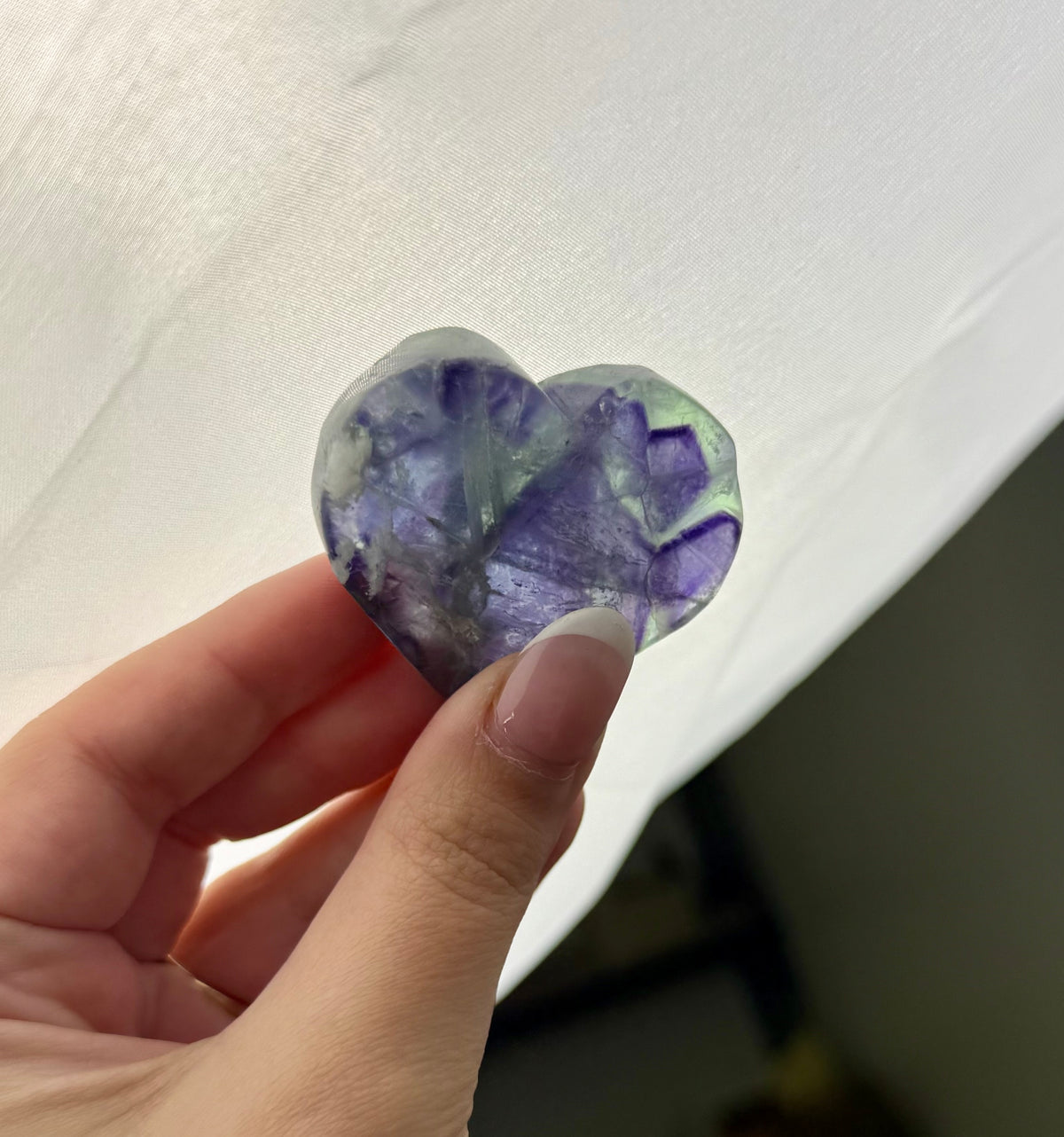 Feather fluorite heart carving