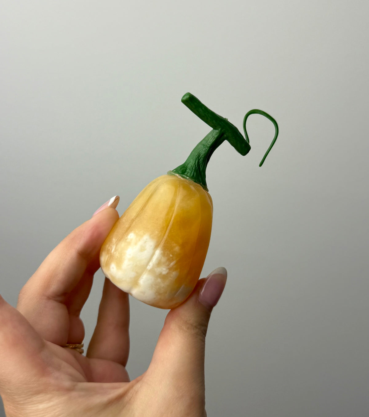 Orange calcite pumpkin carvings