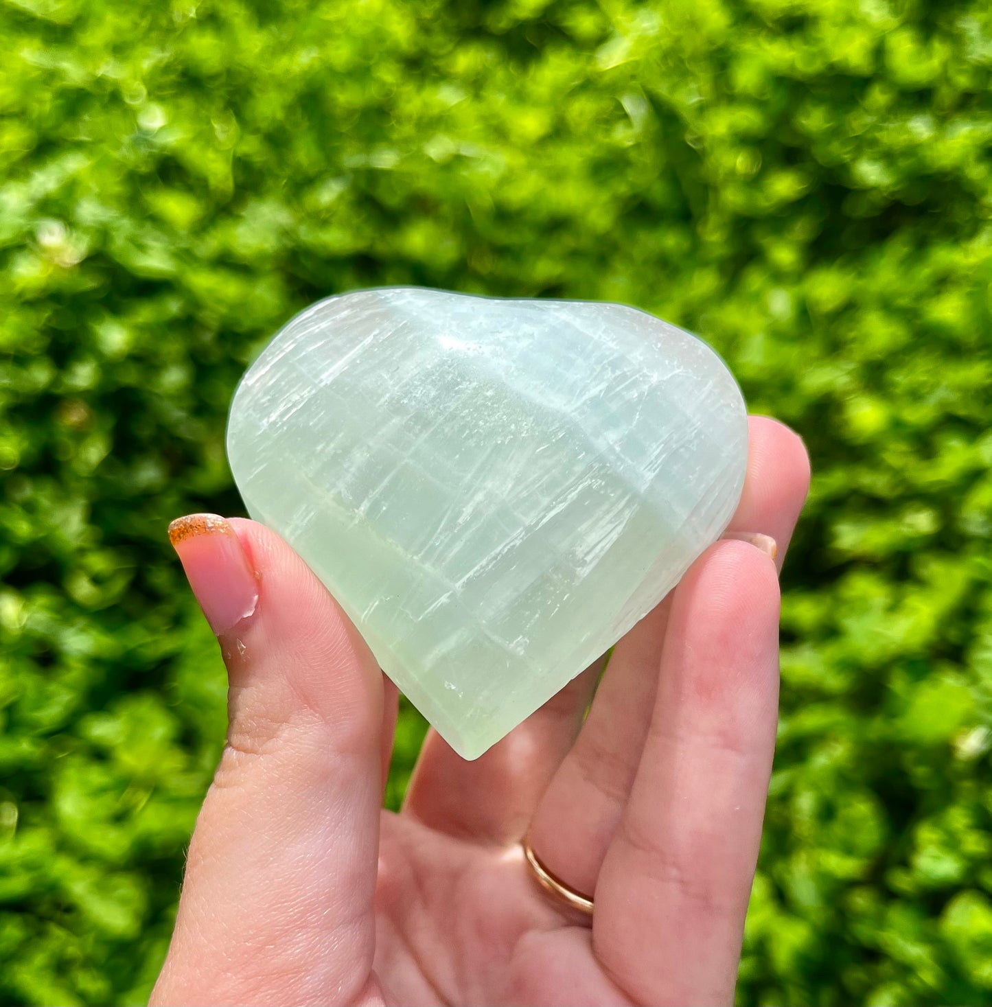 Pistachio calcite heart carving