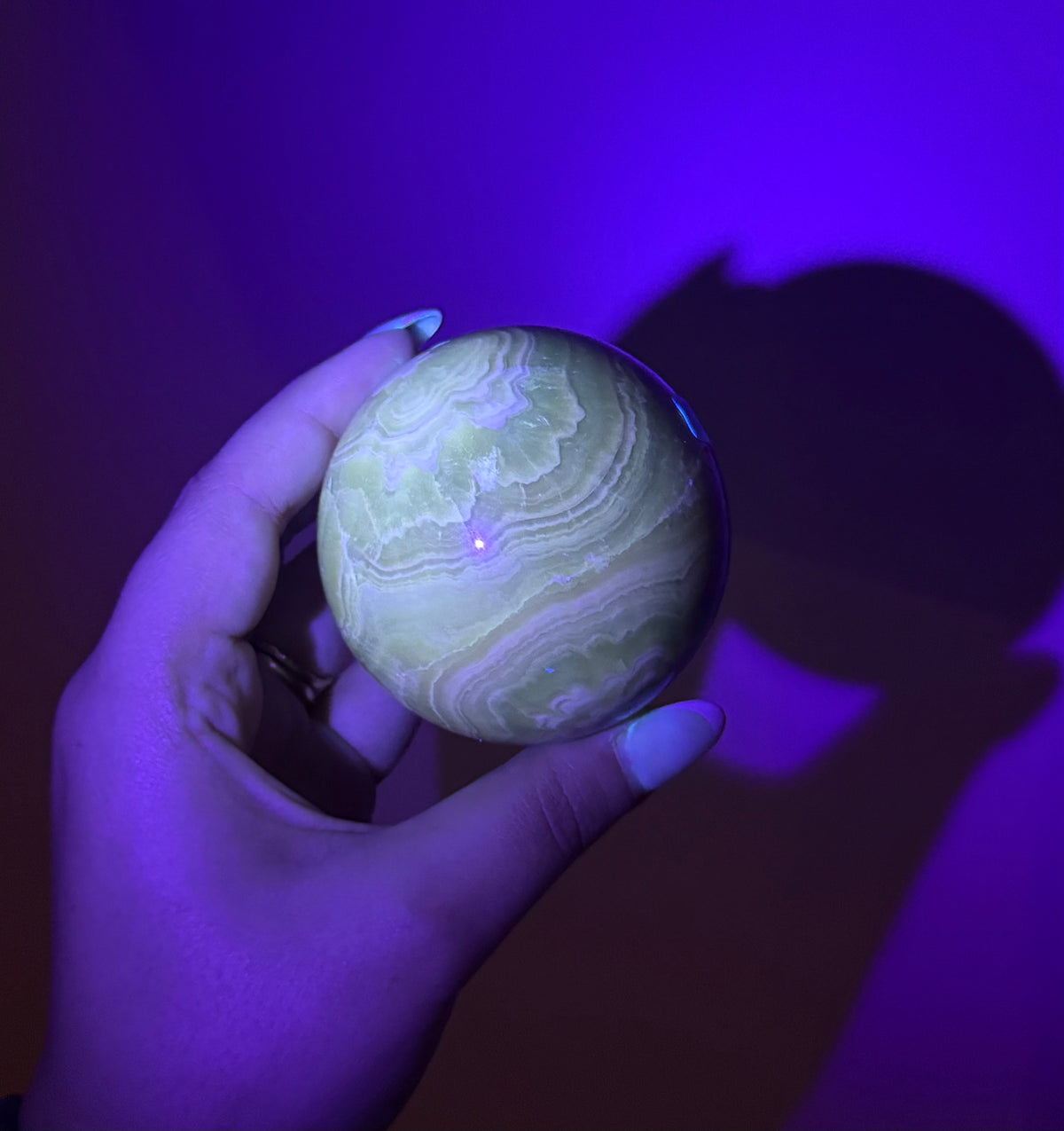 Amber calcite sphere