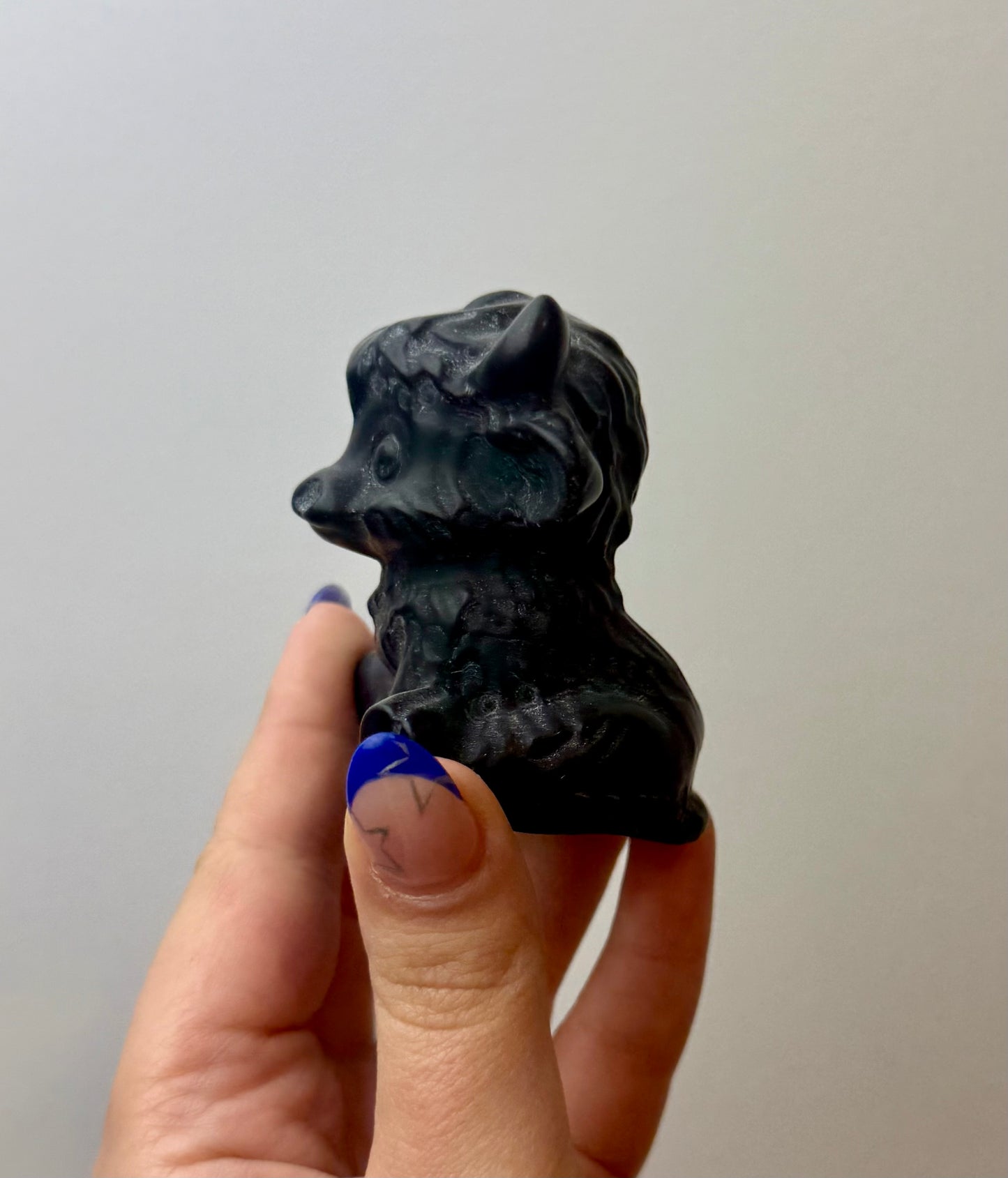 Obsidian cow carving