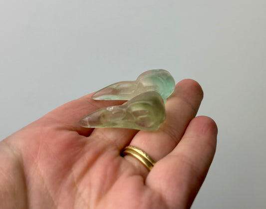 Fluorite Raven head carvings