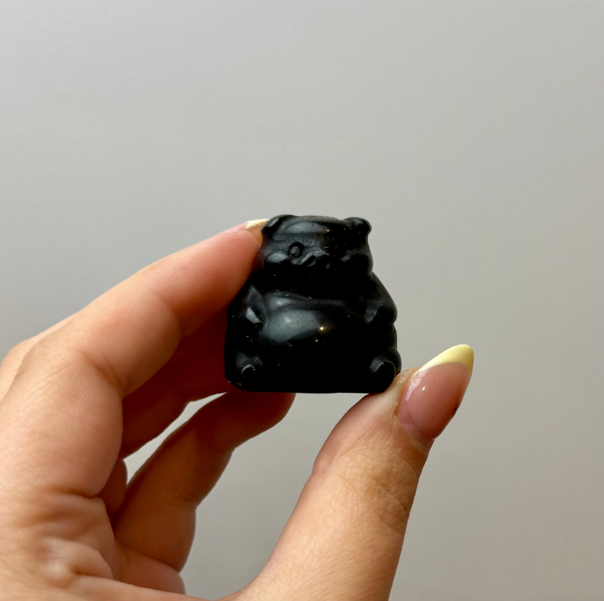 Obsidian chubby pig carving