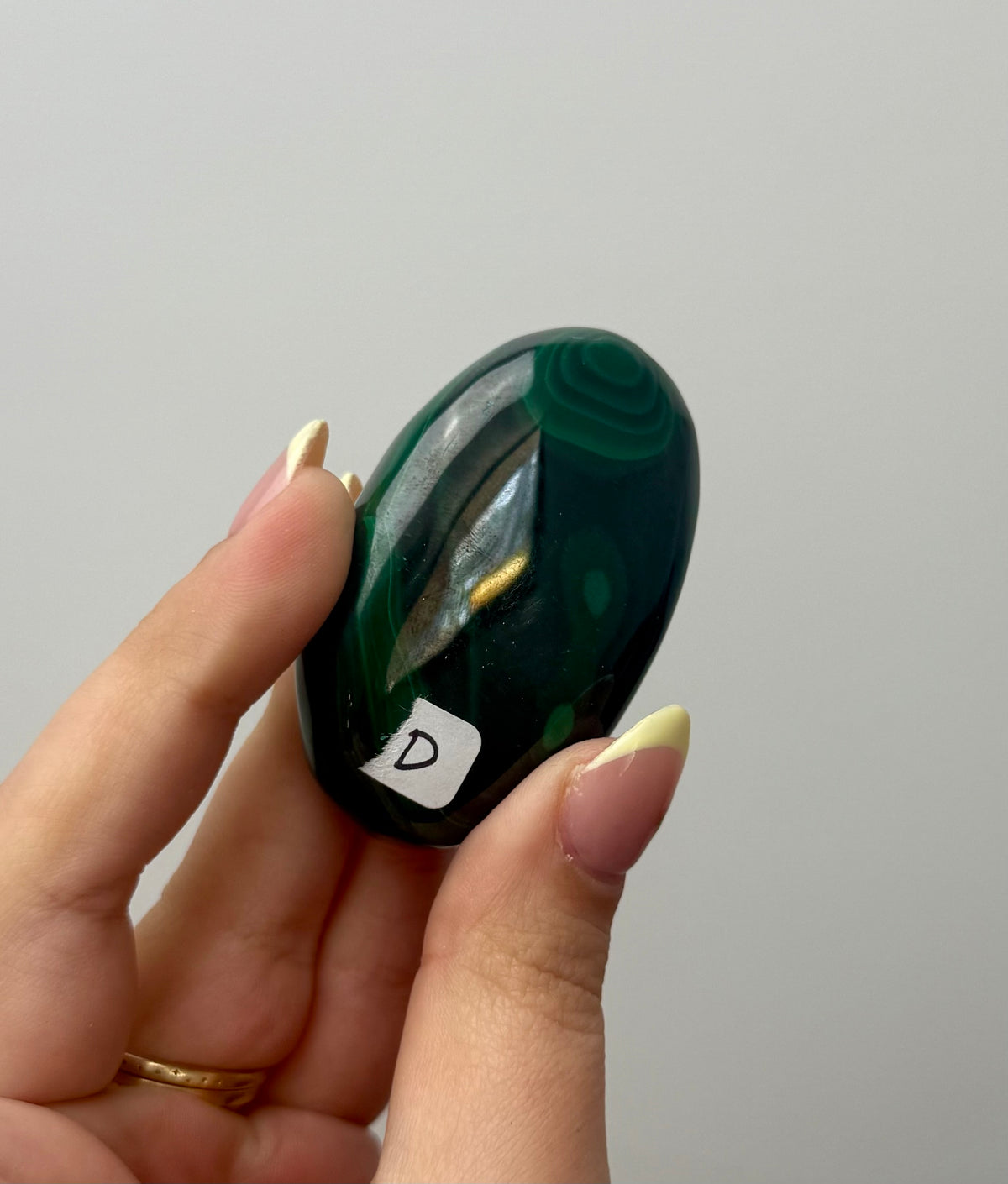 Malachite palm stone D