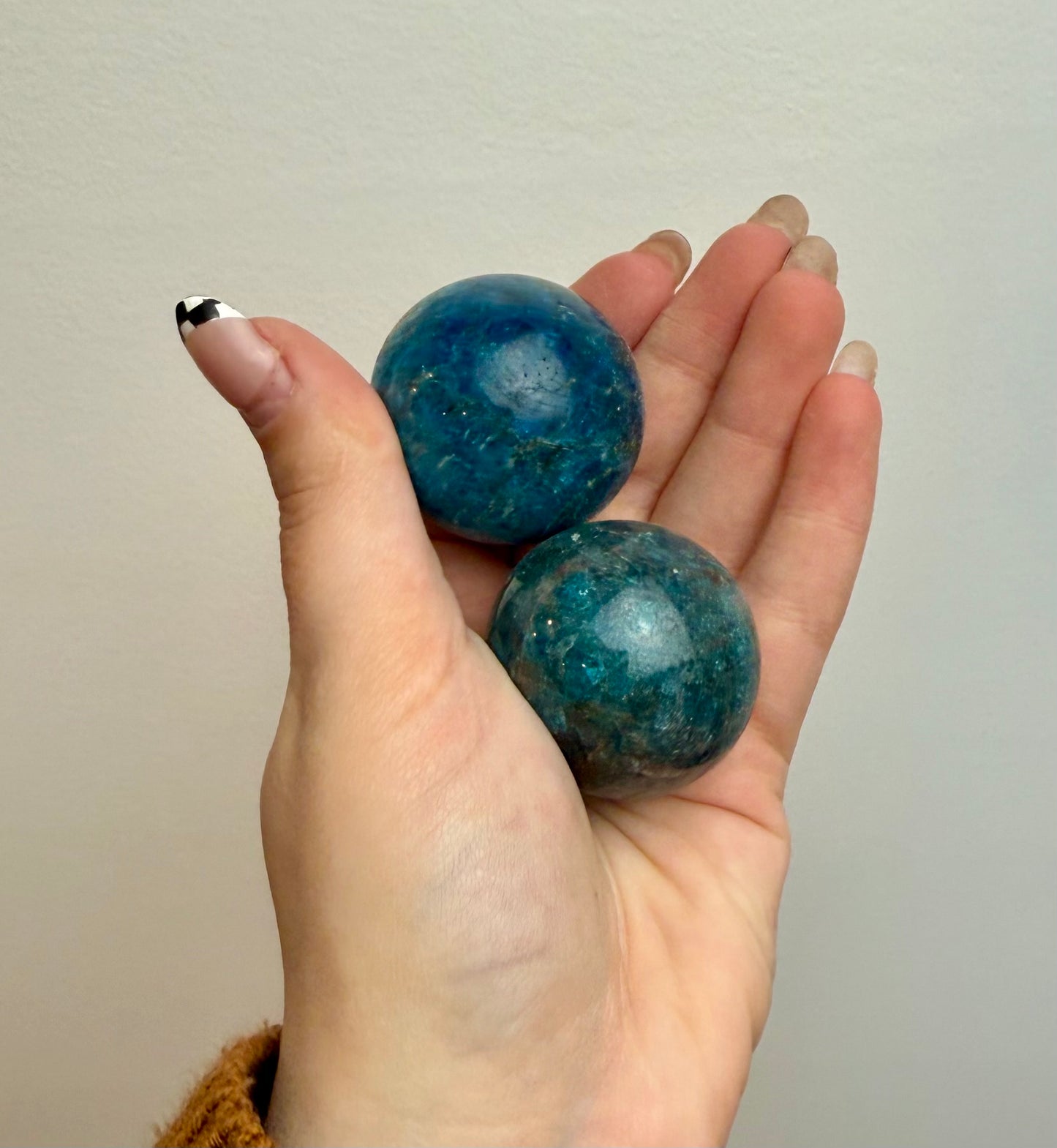 Blue apatite spheres