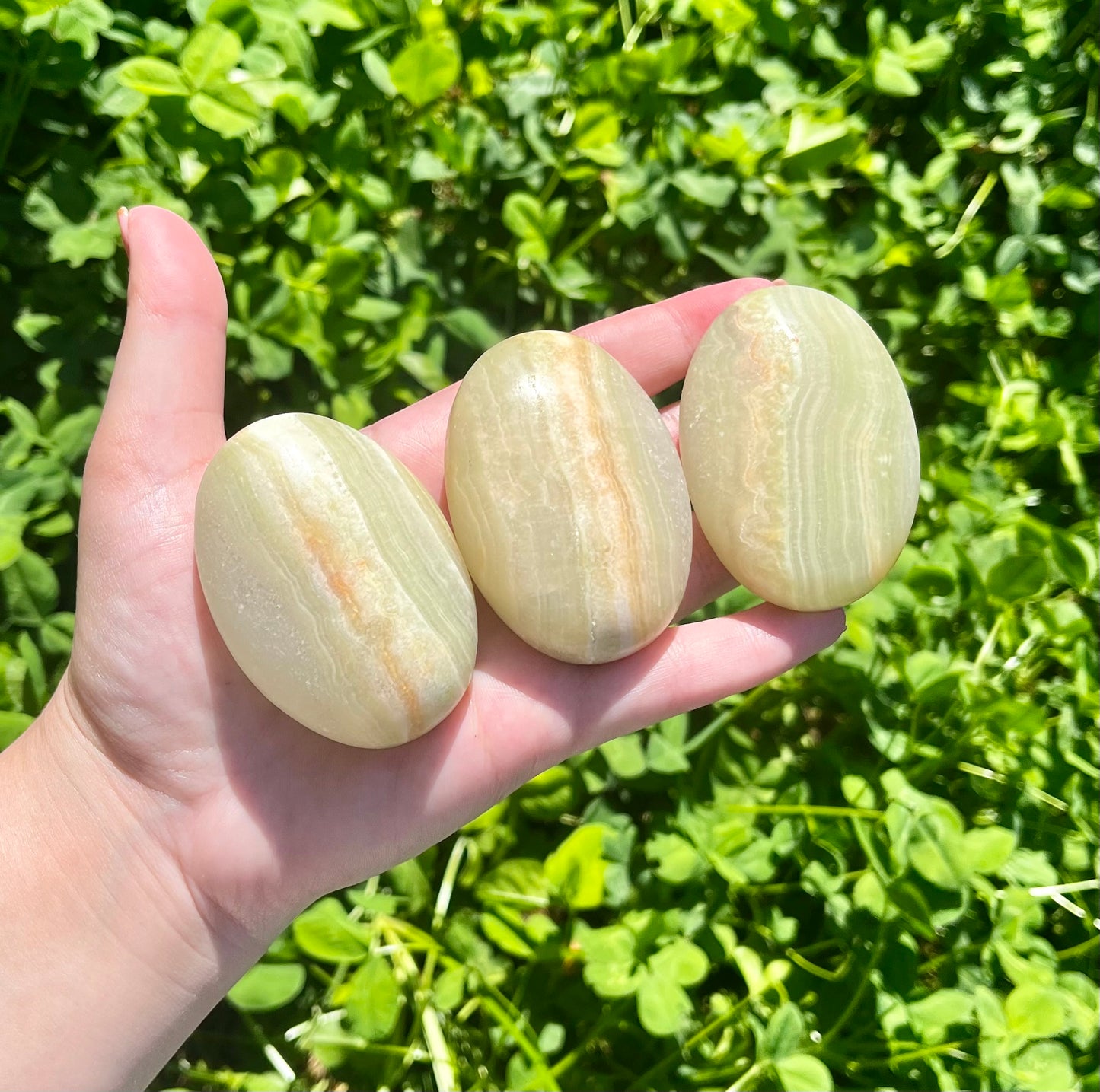 Green onyx palm stones