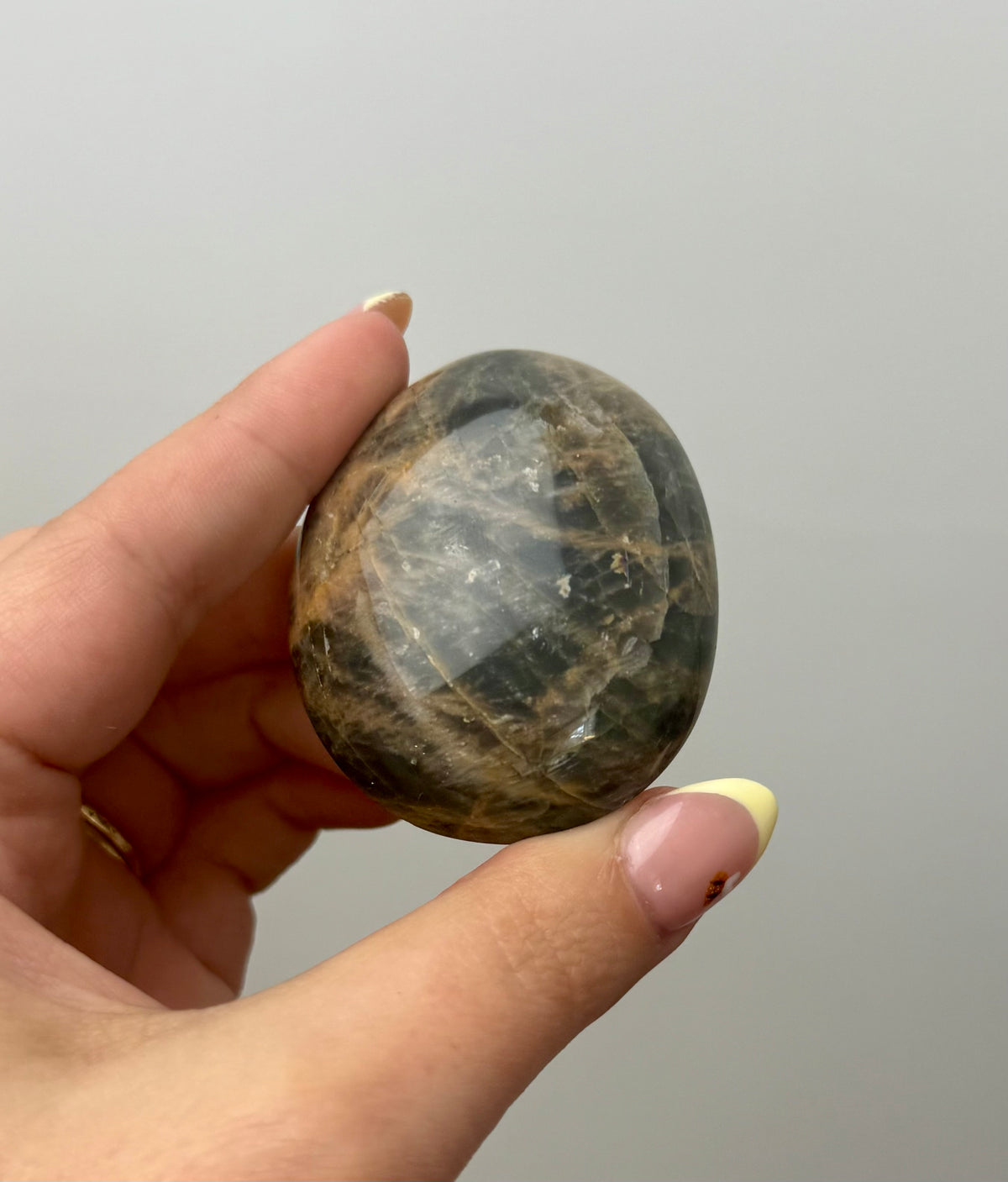 Black moonstone palm stones