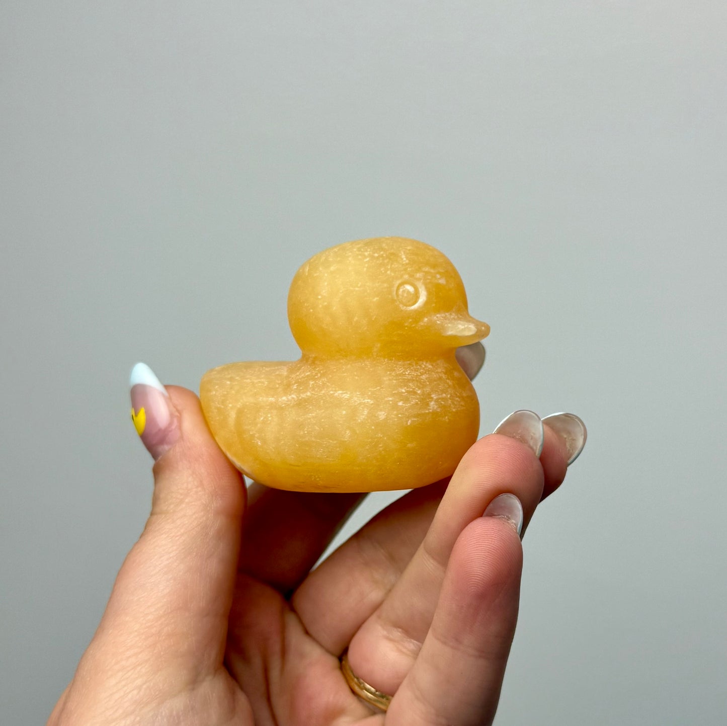 Orange calcite duck carvings