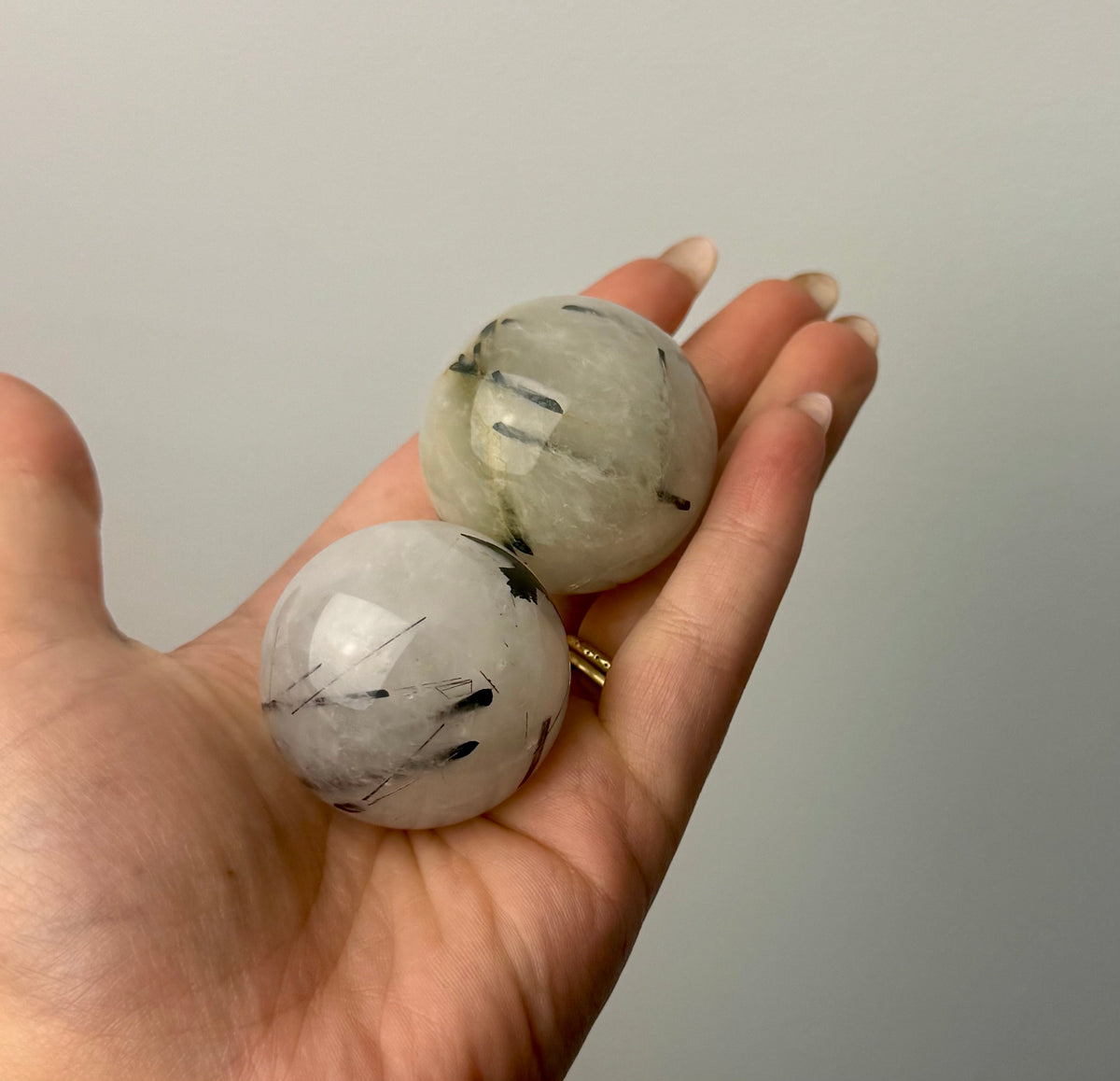 Black tourmaline in quartz spheres
