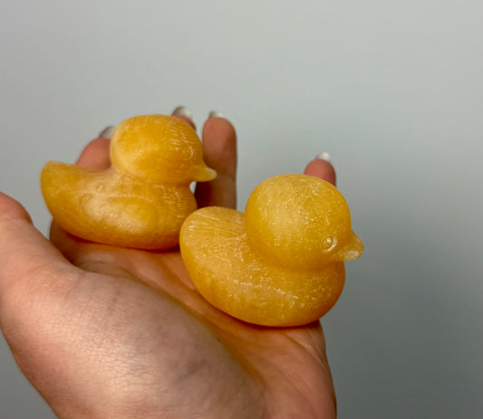 Orange calcite duck carvings
