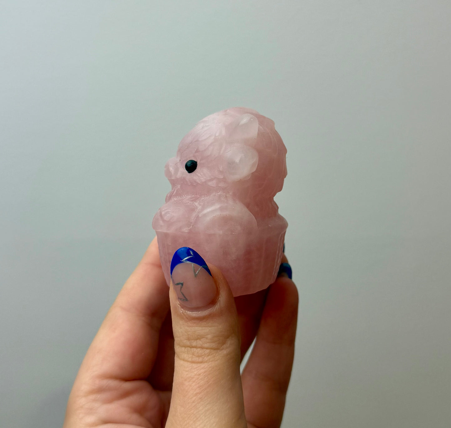 Rose quartz cow carving