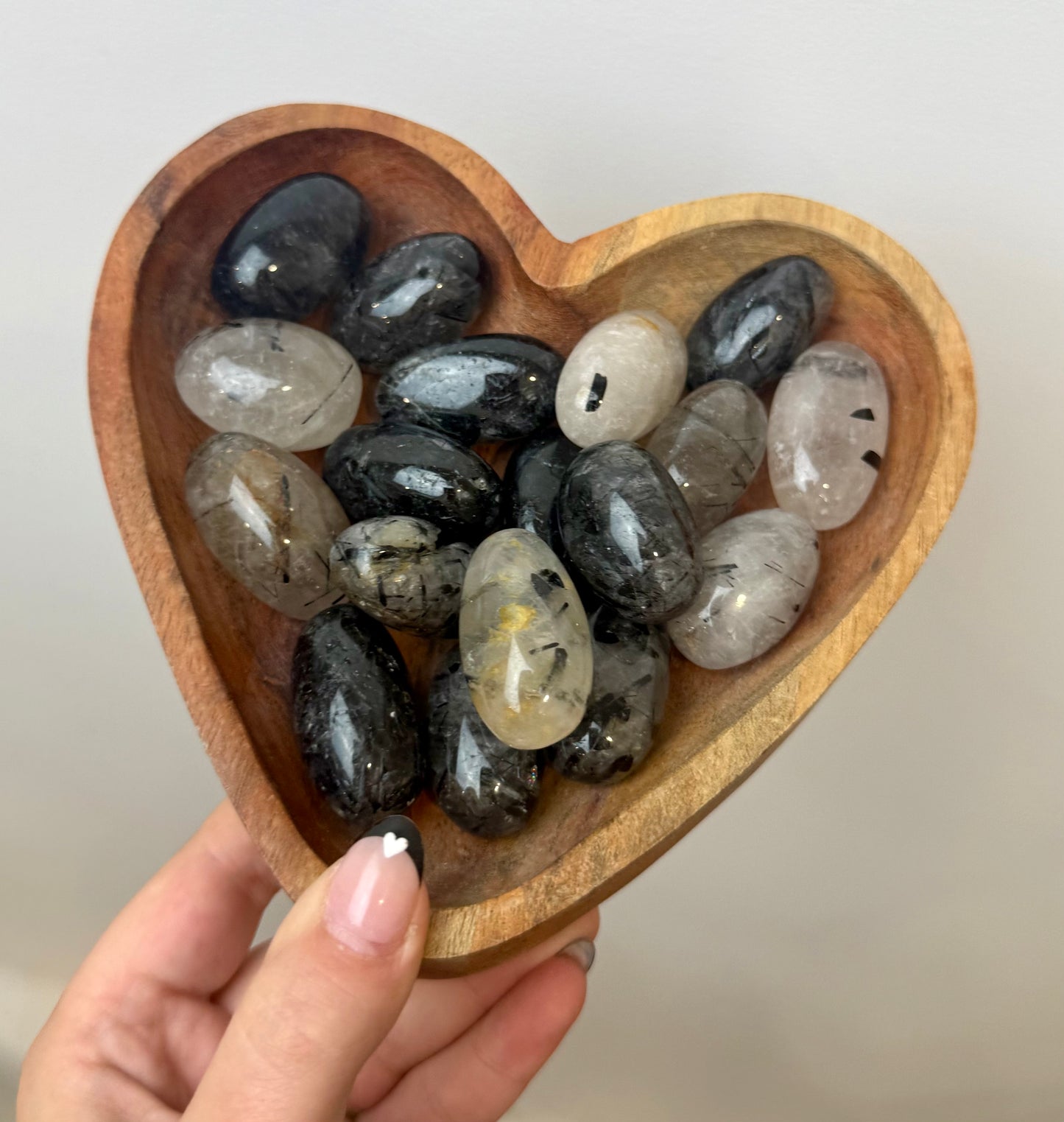 Black tourmaline in quartz tumbles