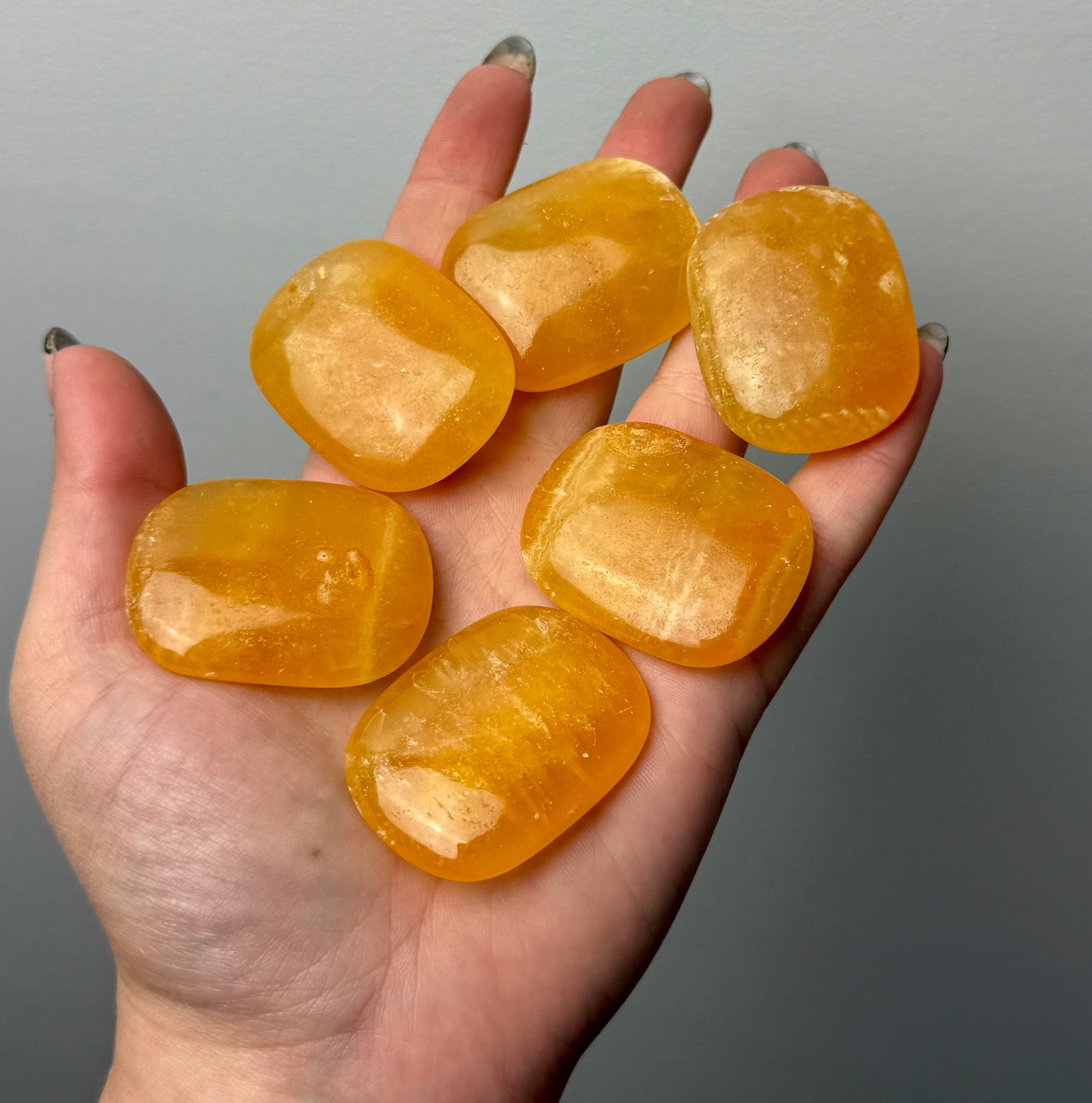 Orange calcite flat stones