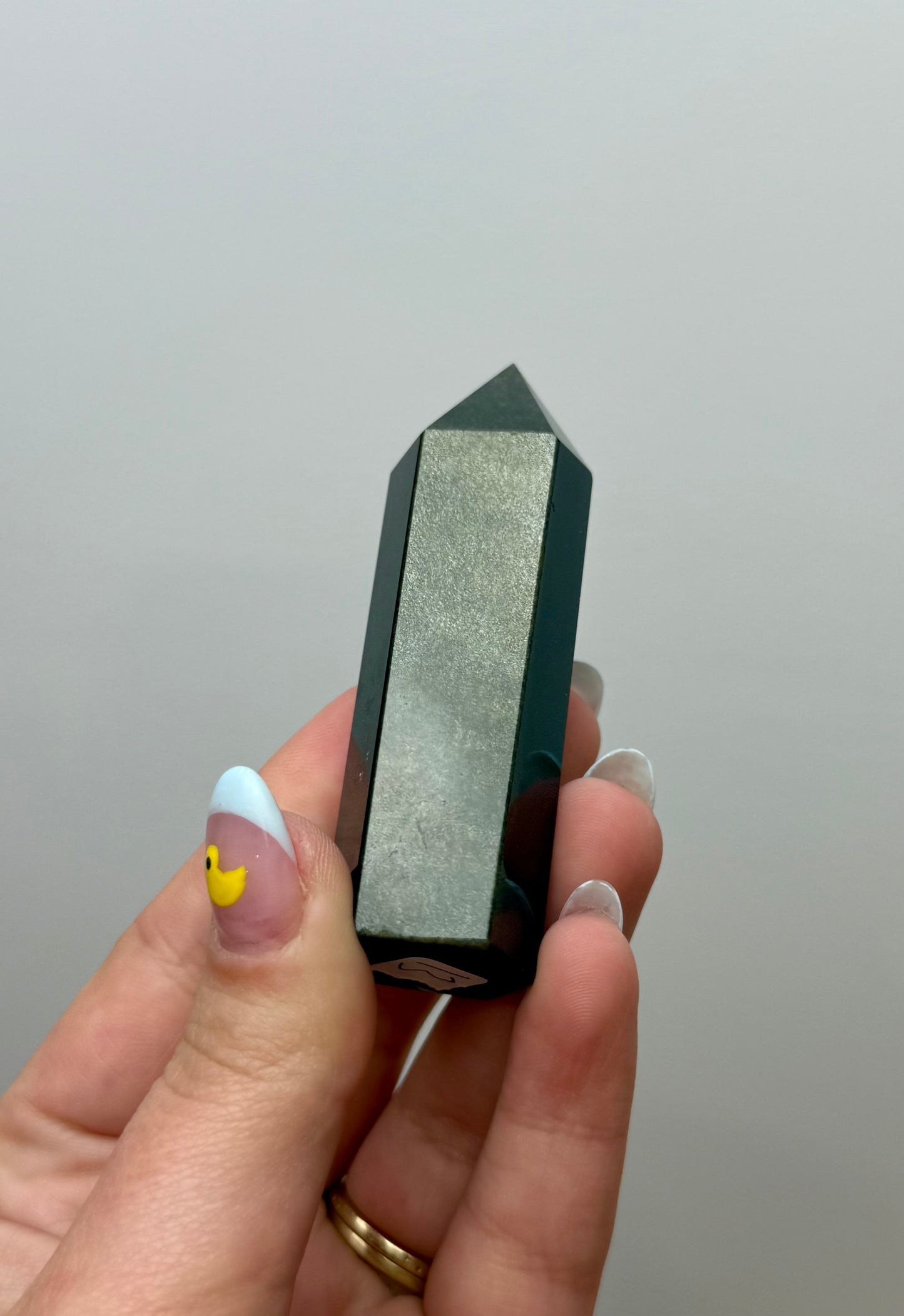 Gold sheen obsidian tower