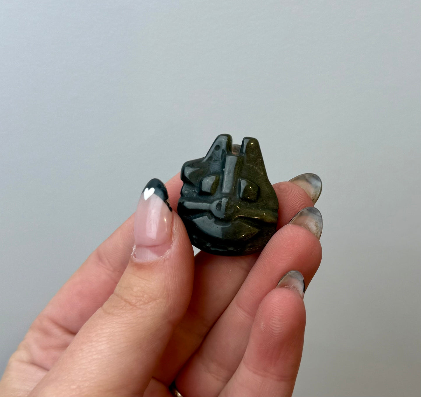Gold sheen obsidian millennium falcon carving ￼