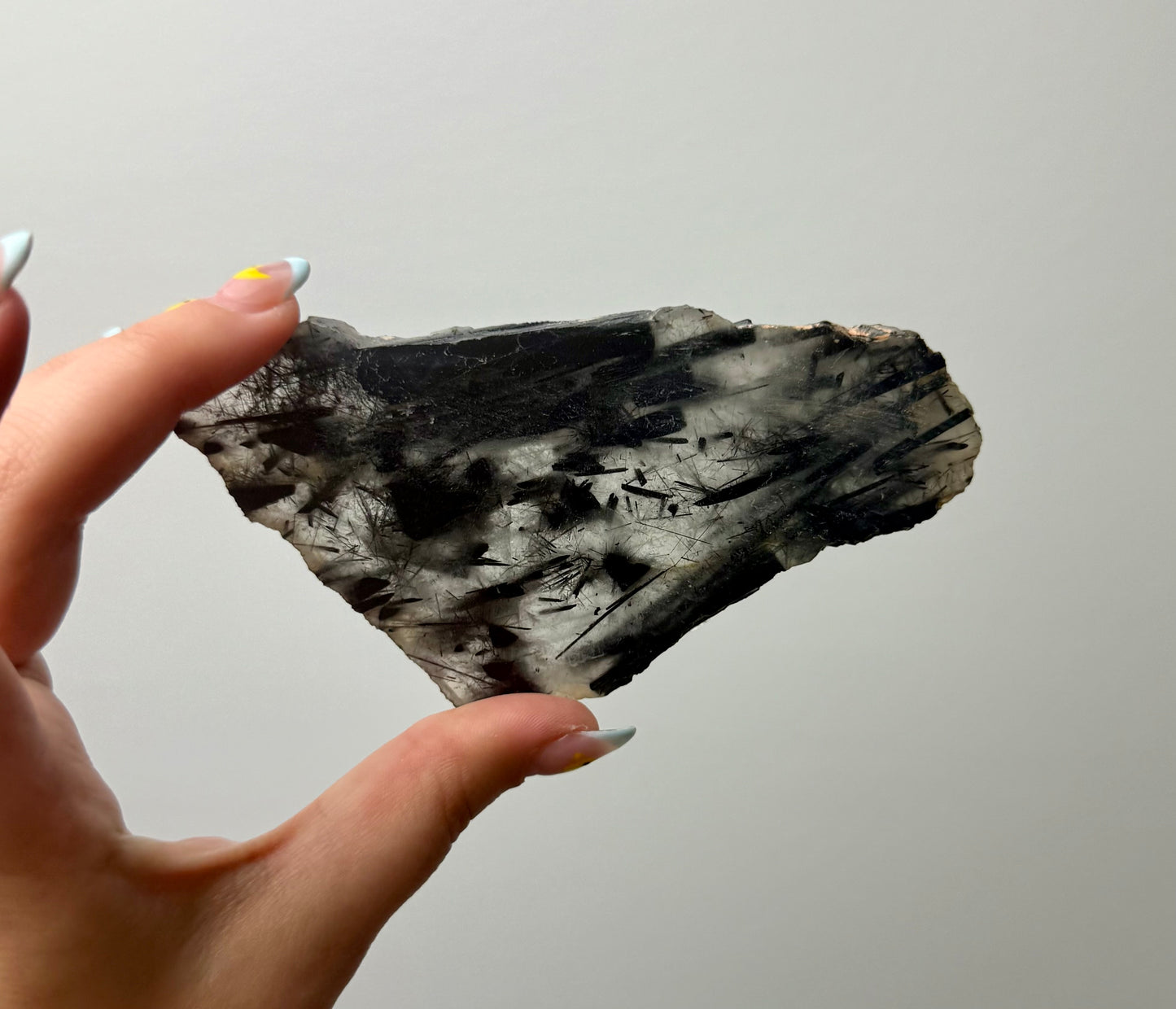 Black tourmaline in quartz slab