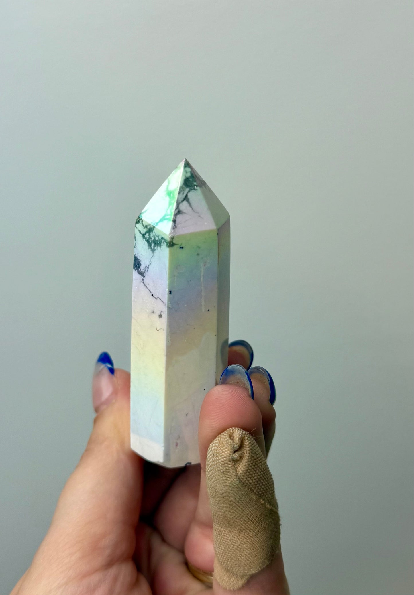 Altered aura howlite tower