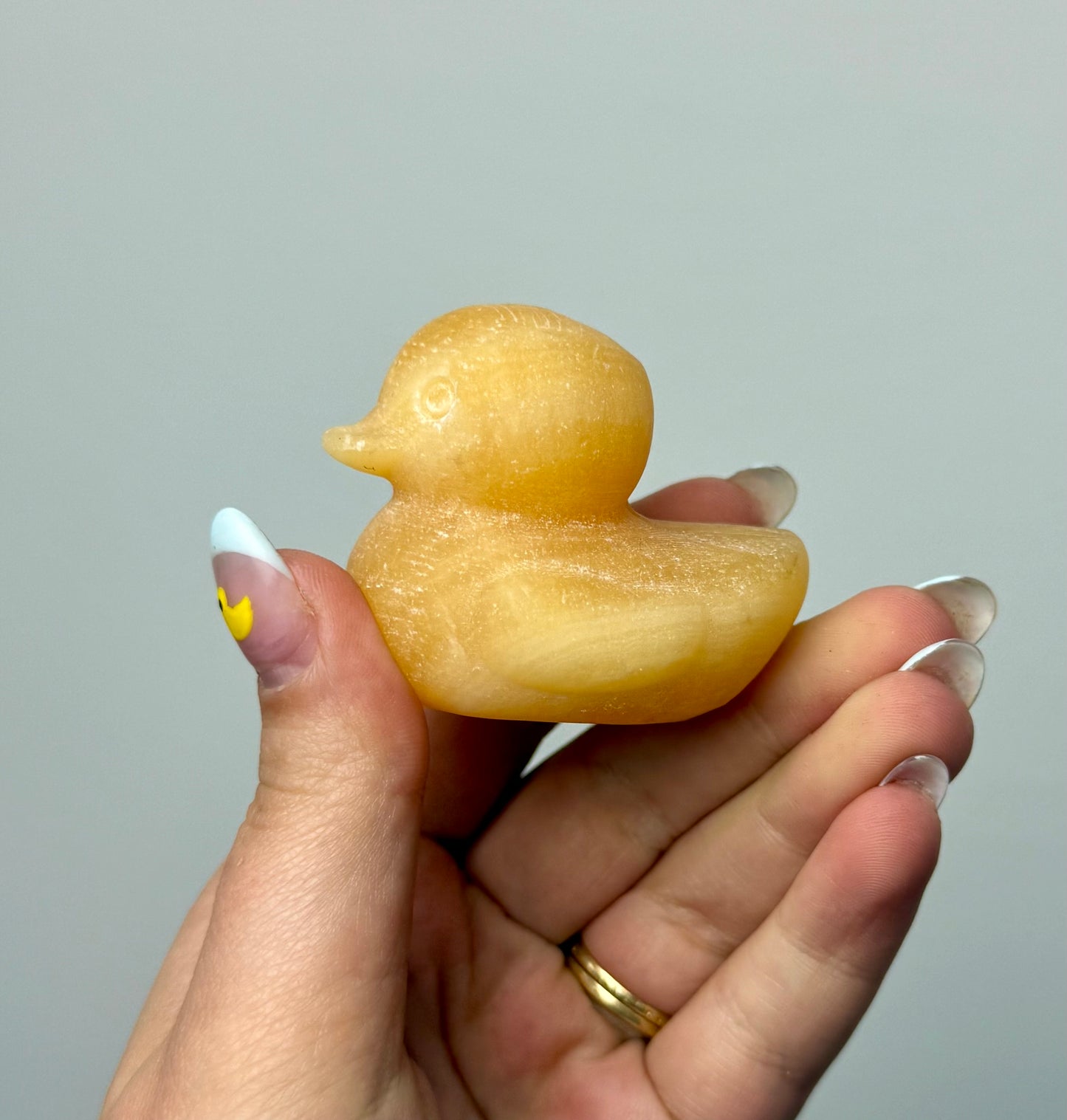 Orange calcite duck carvings