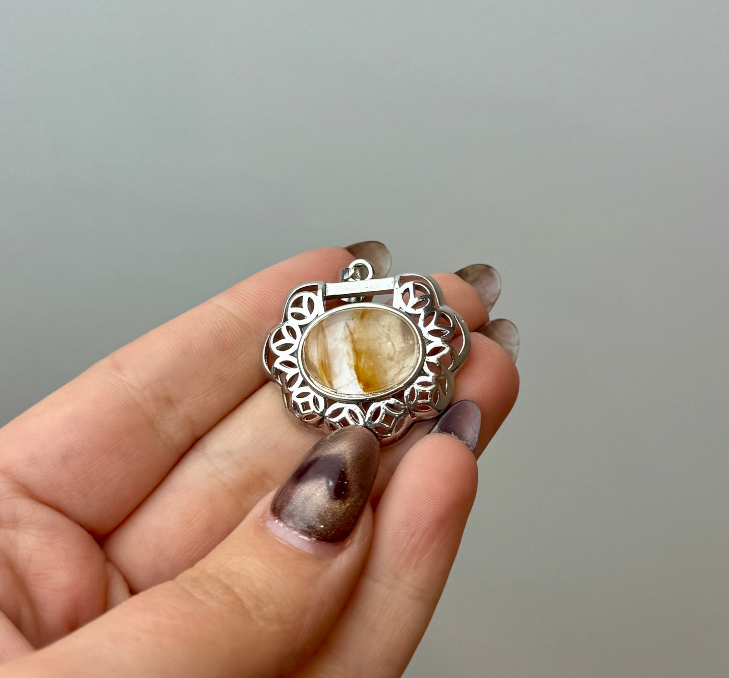 Golden healer pendant
