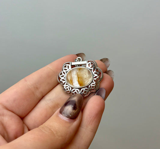 Golden healer pendant
