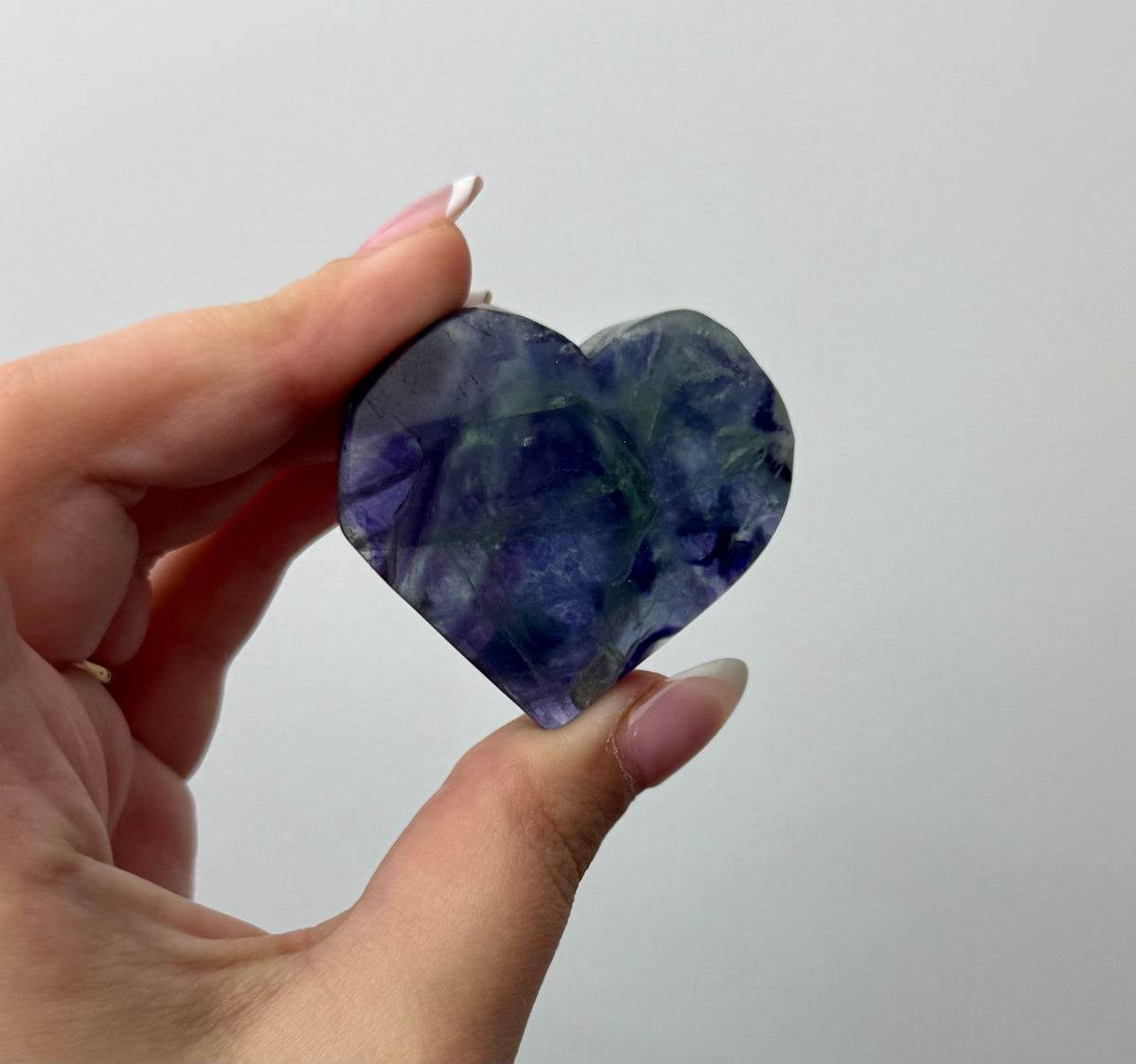Feather fluorite heart carving