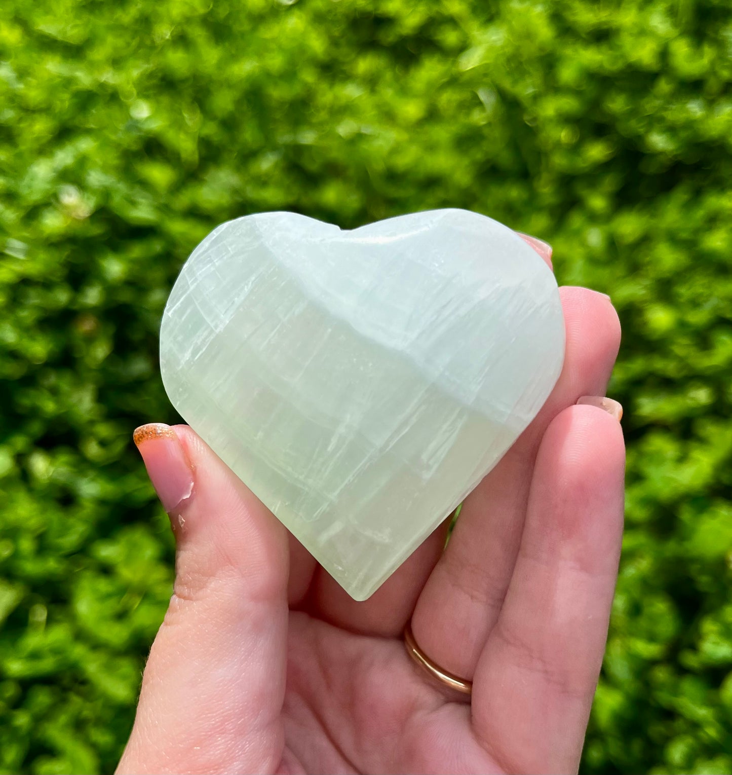 Pistachio calcite heart carving