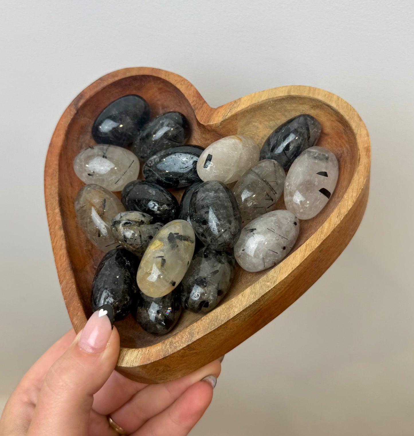 Black tourmaline in quartz tumbles