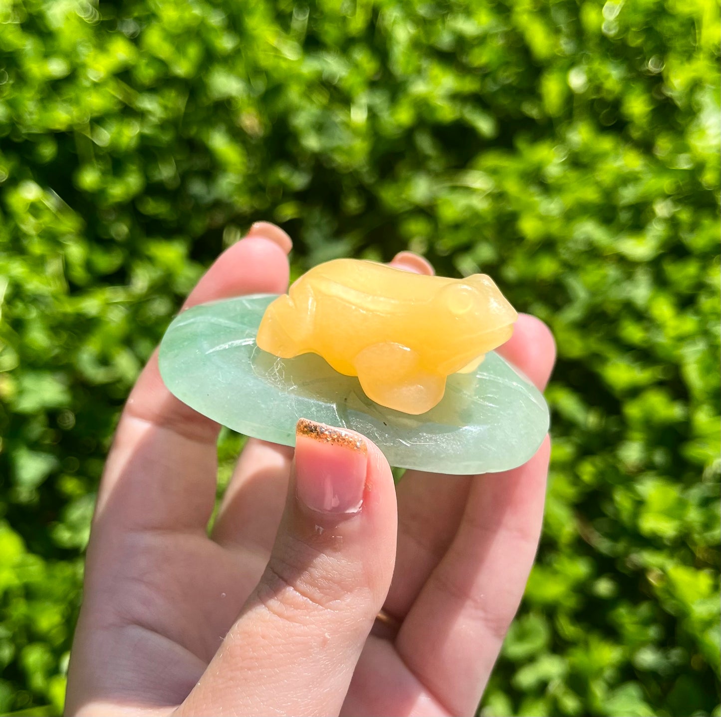 Frog on lily pad carving