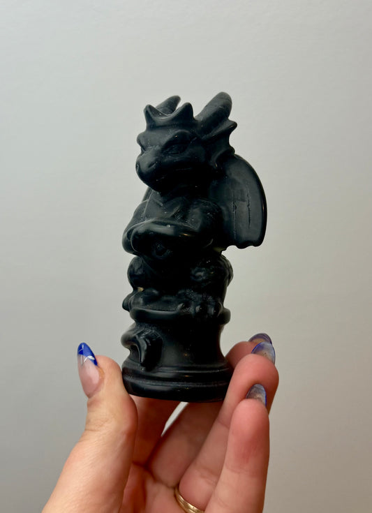 Obsidian dragon carving