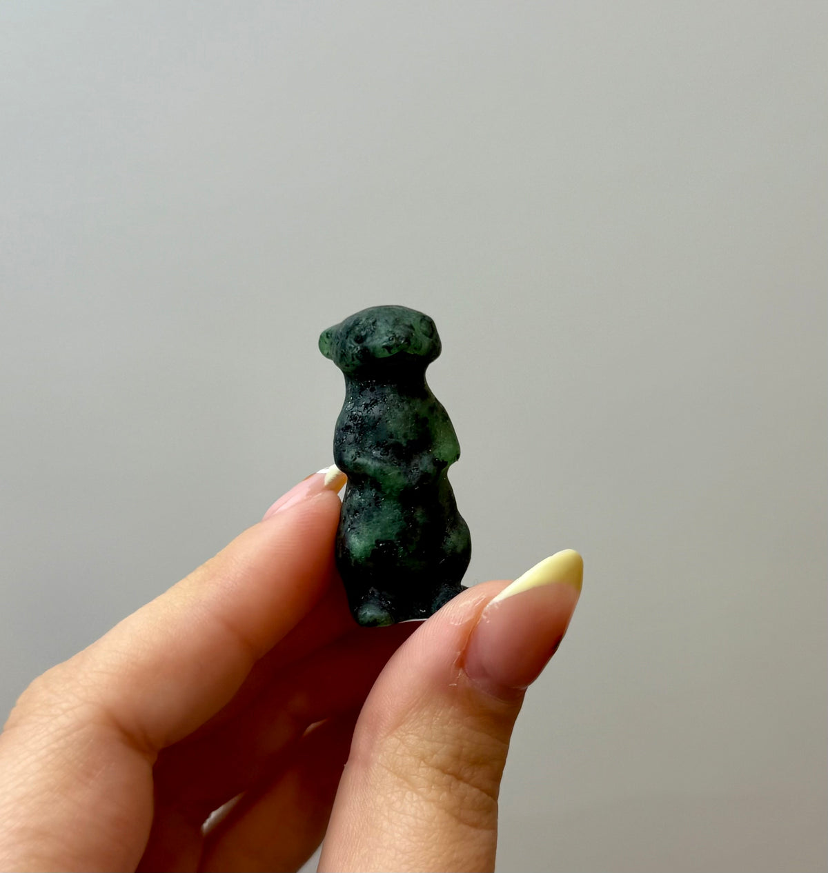 Ruby zoisite meerkat carving